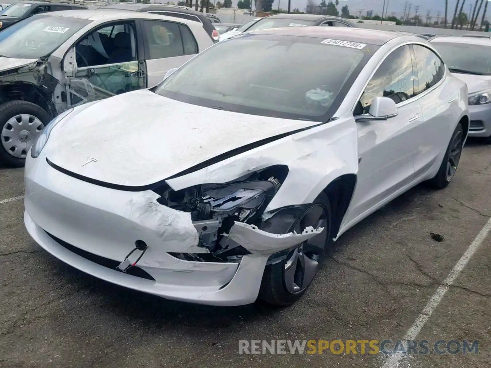 2 Photograph of a damaged car 5YJ3E1EB2KF191553 TESLA MODEL 3 2019