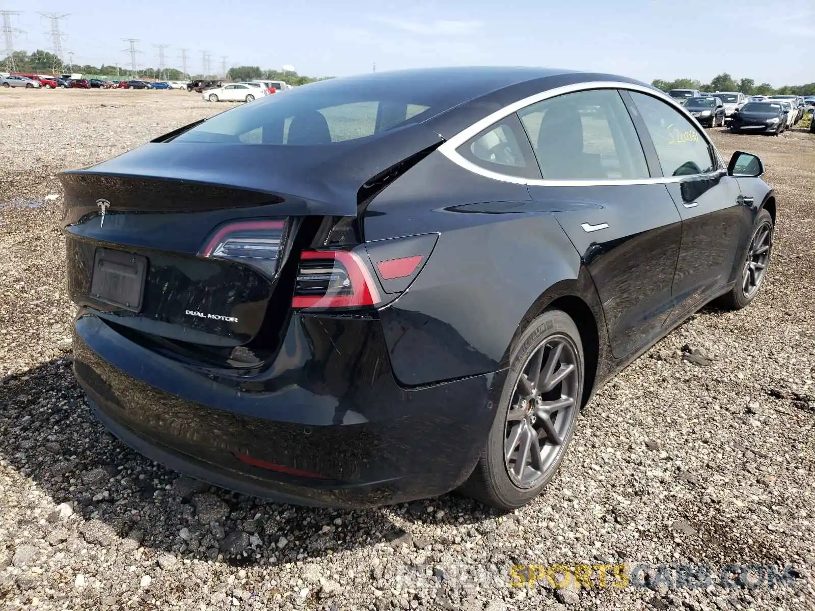 4 Photograph of a damaged car 5YJ3E1EB2KF197028 TESLA MODEL 3 2019