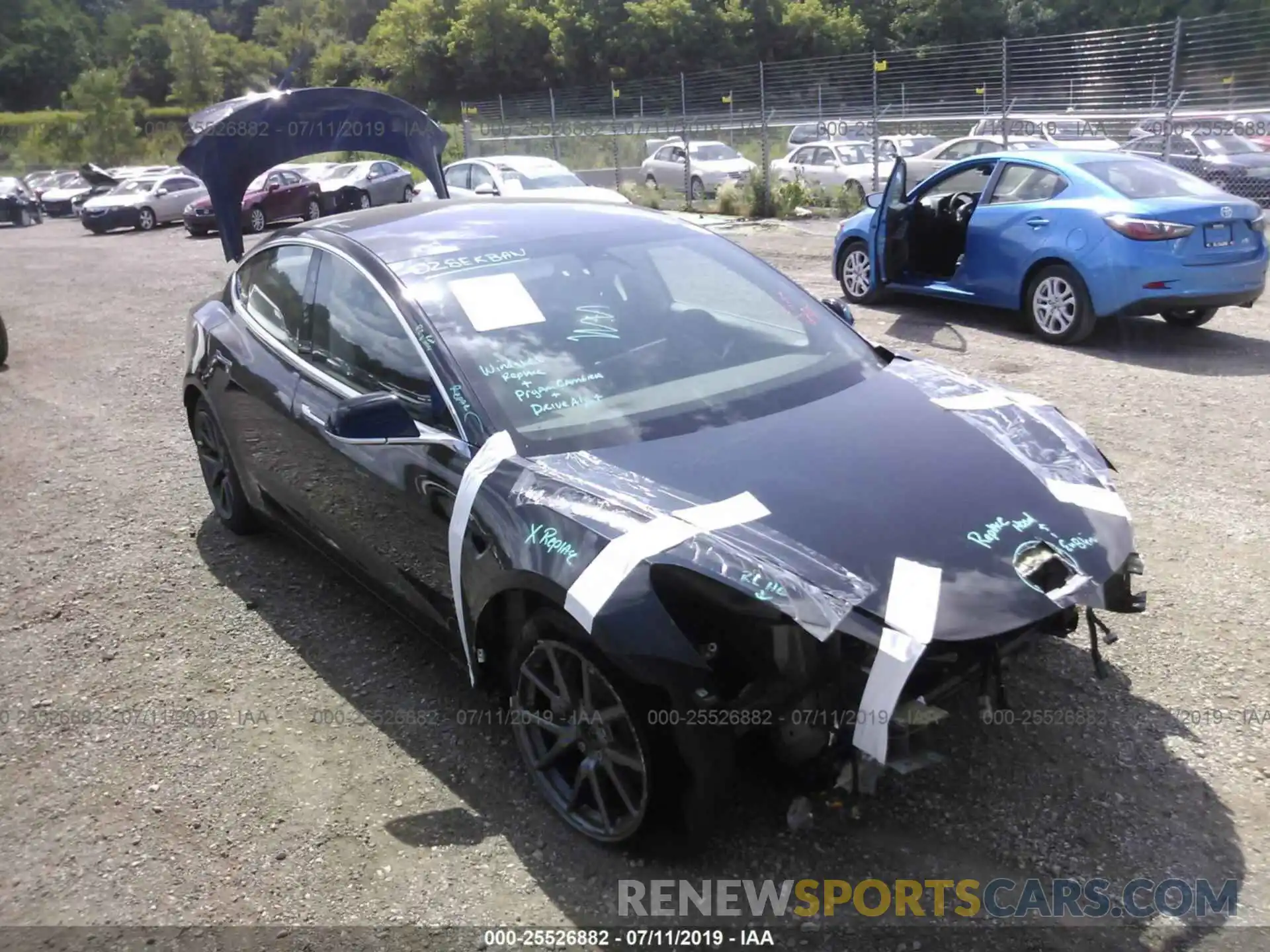 1 Photograph of a damaged car 5YJ3E1EB2KF198907 TESLA MODEL 3 2019