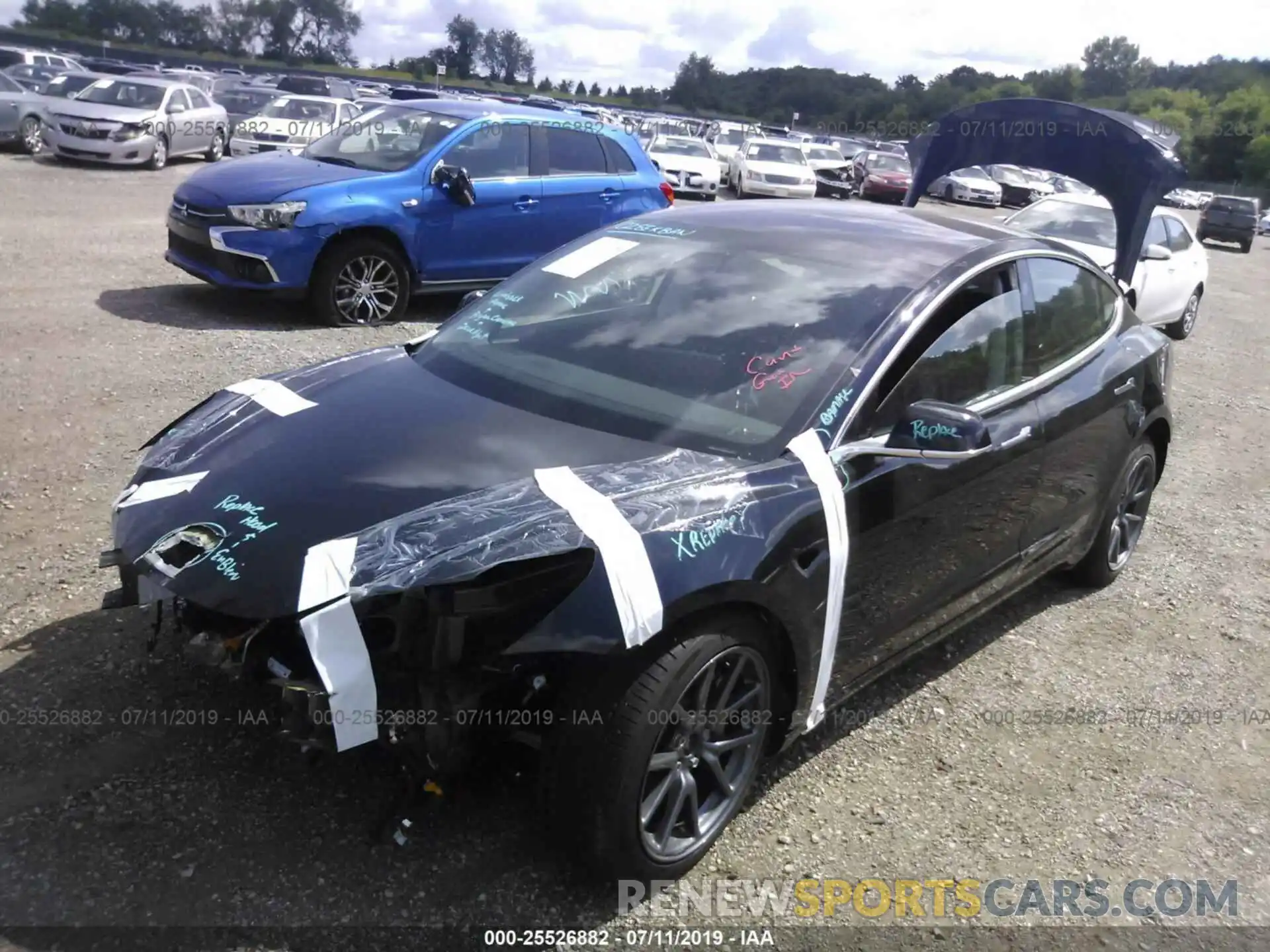 2 Photograph of a damaged car 5YJ3E1EB2KF198907 TESLA MODEL 3 2019