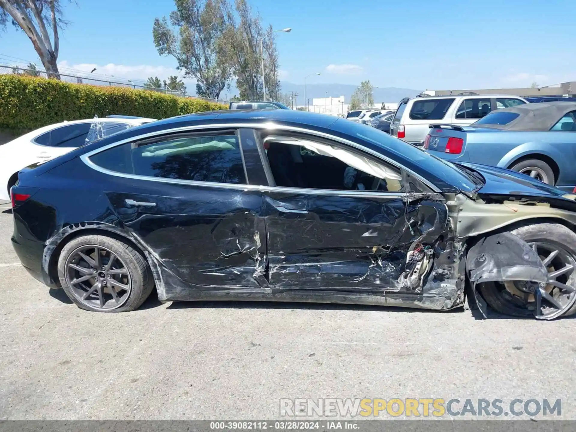 12 Photograph of a damaged car 5YJ3E1EB2KF198941 TESLA MODEL 3 2019