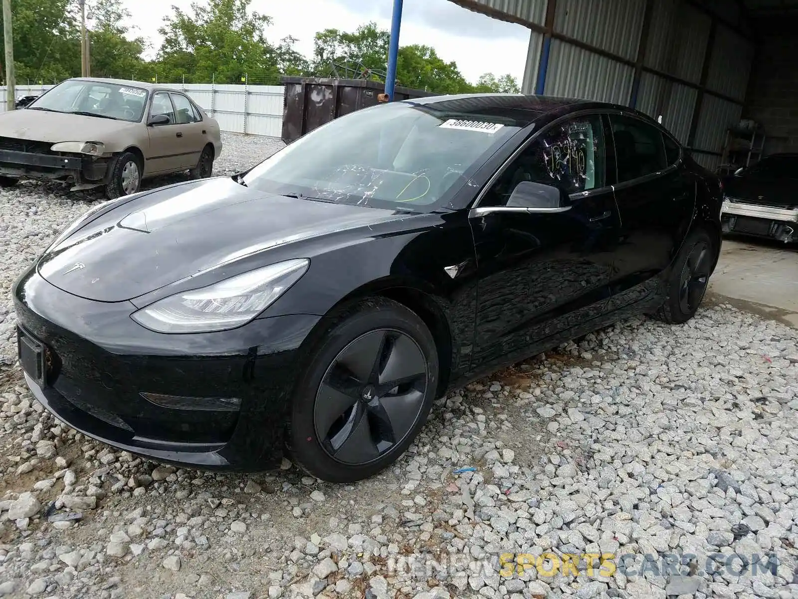 2 Photograph of a damaged car 5YJ3E1EB2KF209095 TESLA MODEL 3 2019