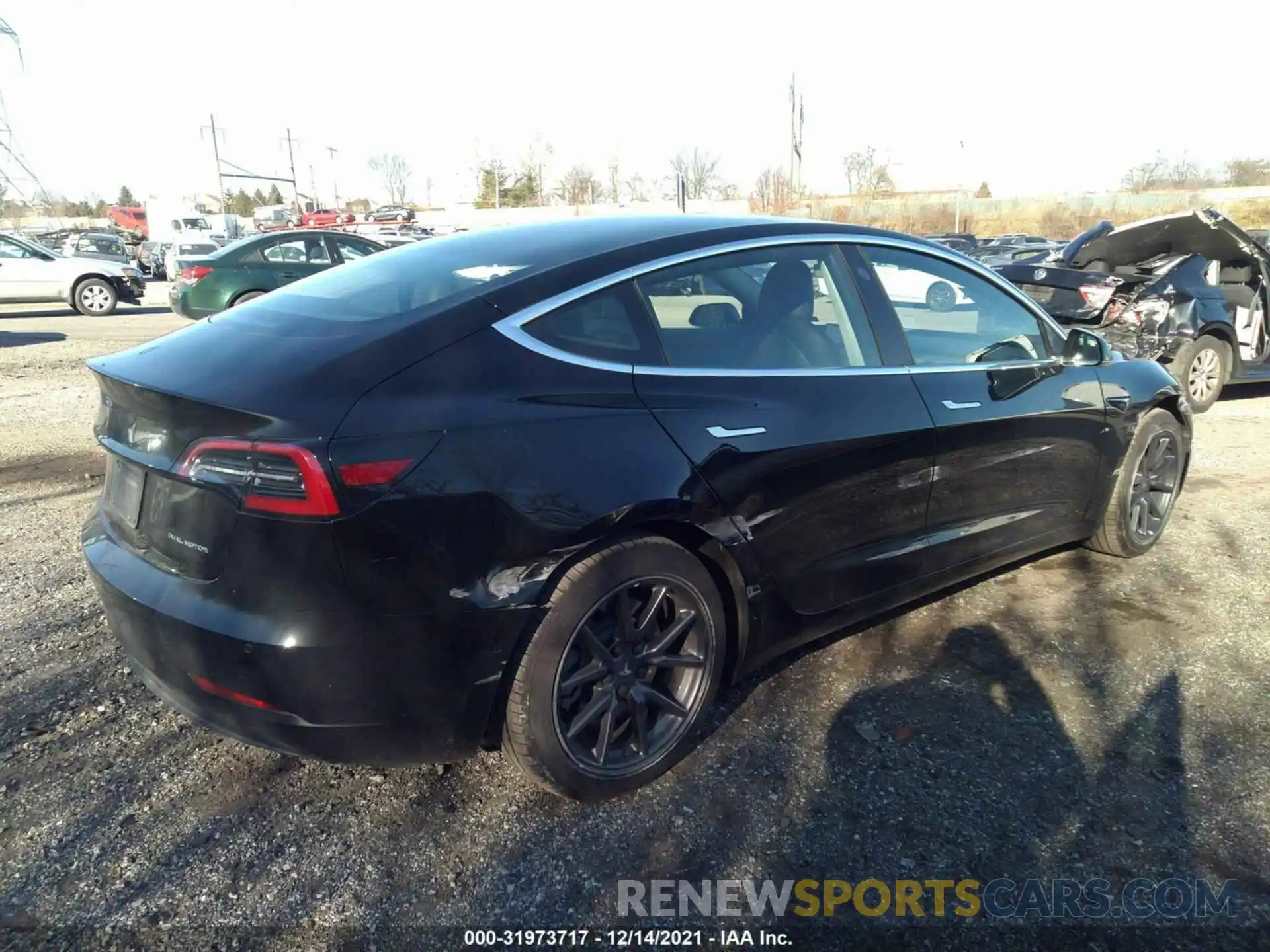 4 Photograph of a damaged car 5YJ3E1EB2KF359367 TESLA MODEL 3 2019