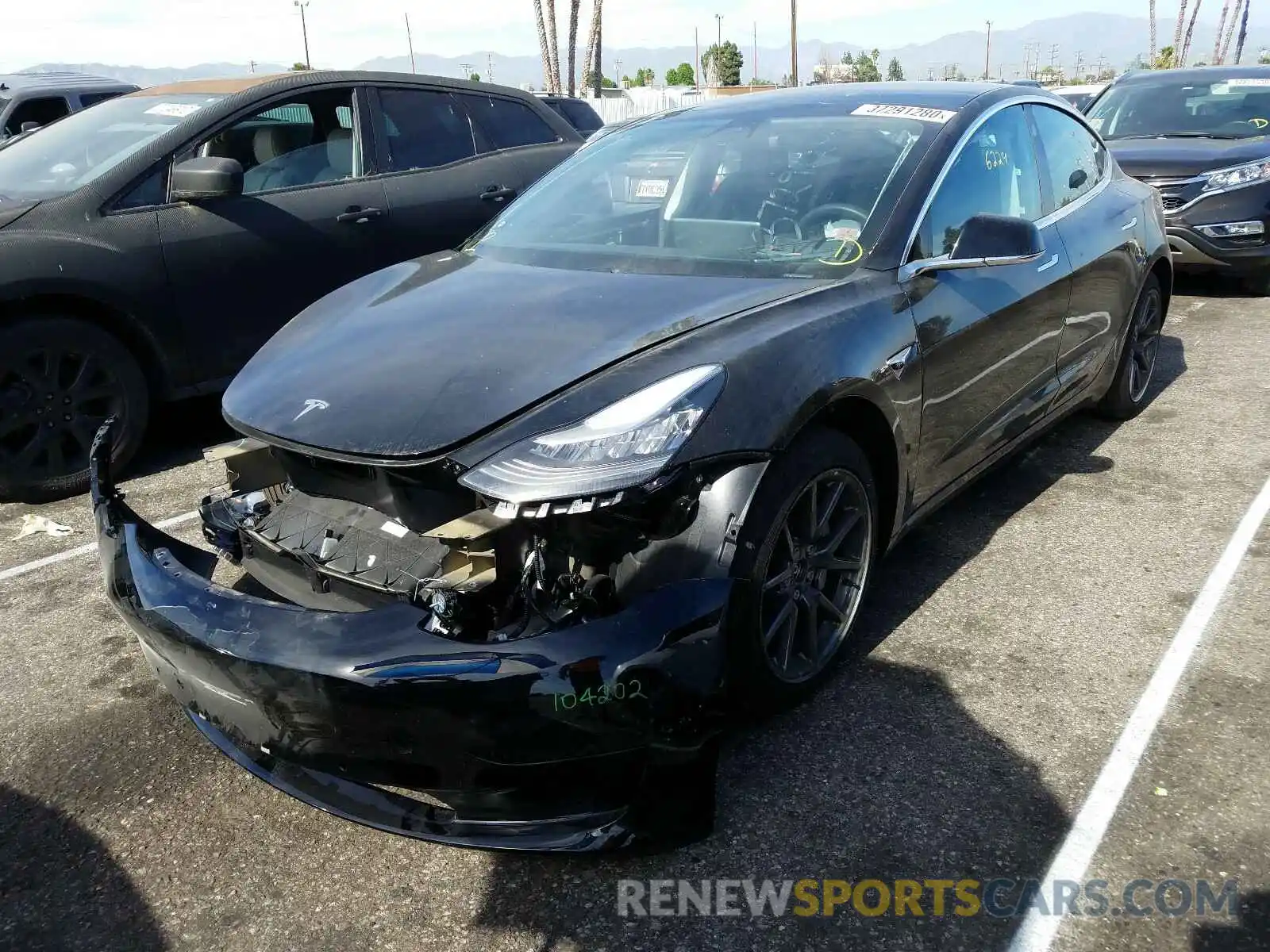 2 Photograph of a damaged car 5YJ3E1EB2KF384947 TESLA MODEL 3 2019