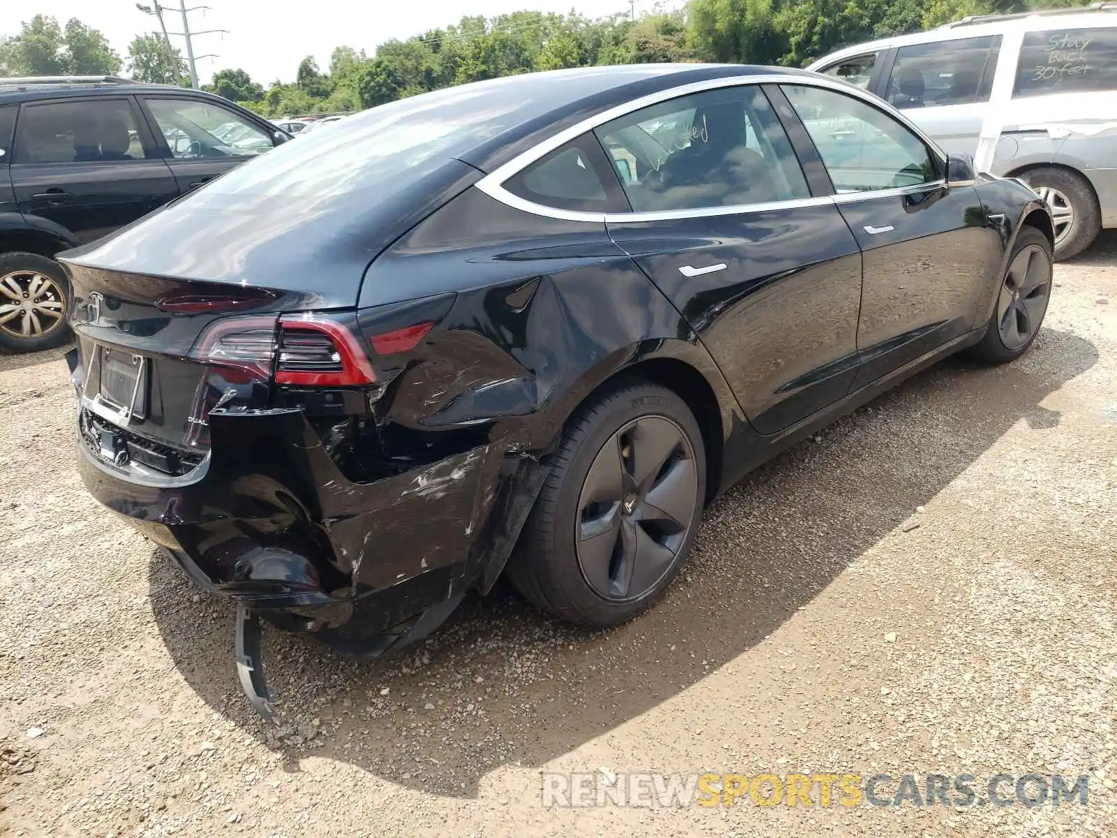 4 Photograph of a damaged car 5YJ3E1EB2KF385631 TESLA MODEL 3 2019