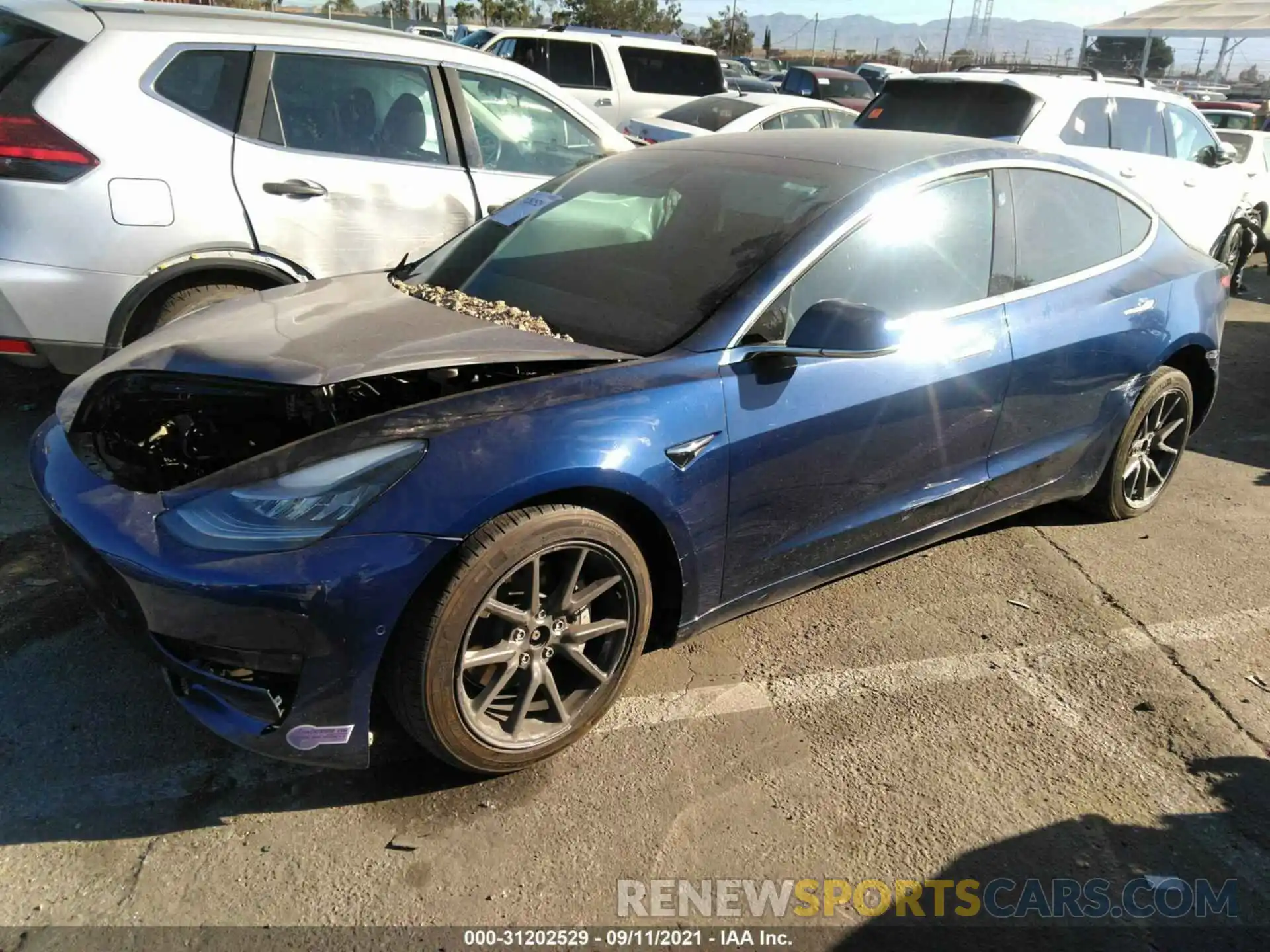 2 Photograph of a damaged car 5YJ3E1EB2KF385791 TESLA MODEL 3 2019