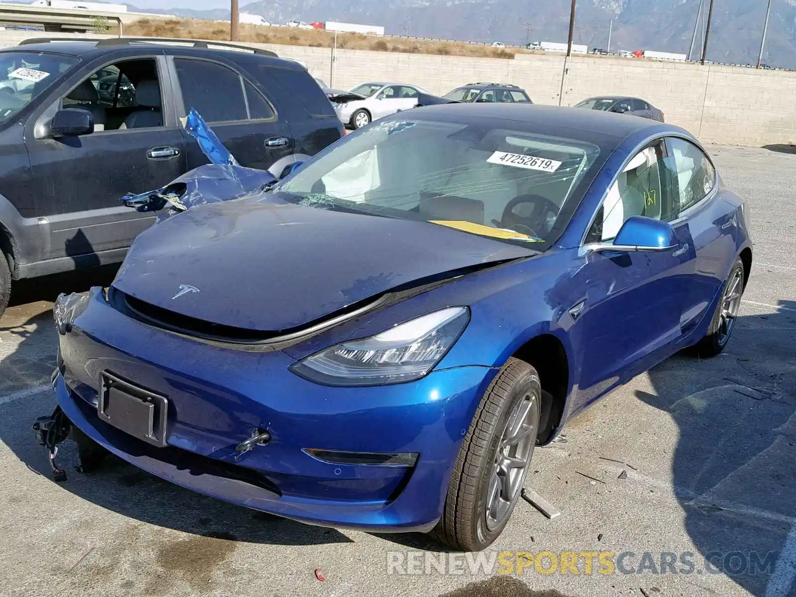 2 Photograph of a damaged car 5YJ3E1EB2KF450560 TESLA MODEL 3 2019