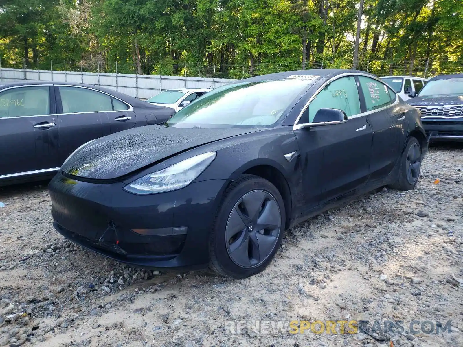 2 Photograph of a damaged car 5YJ3E1EB2KF450641 TESLA MODEL 3 2019