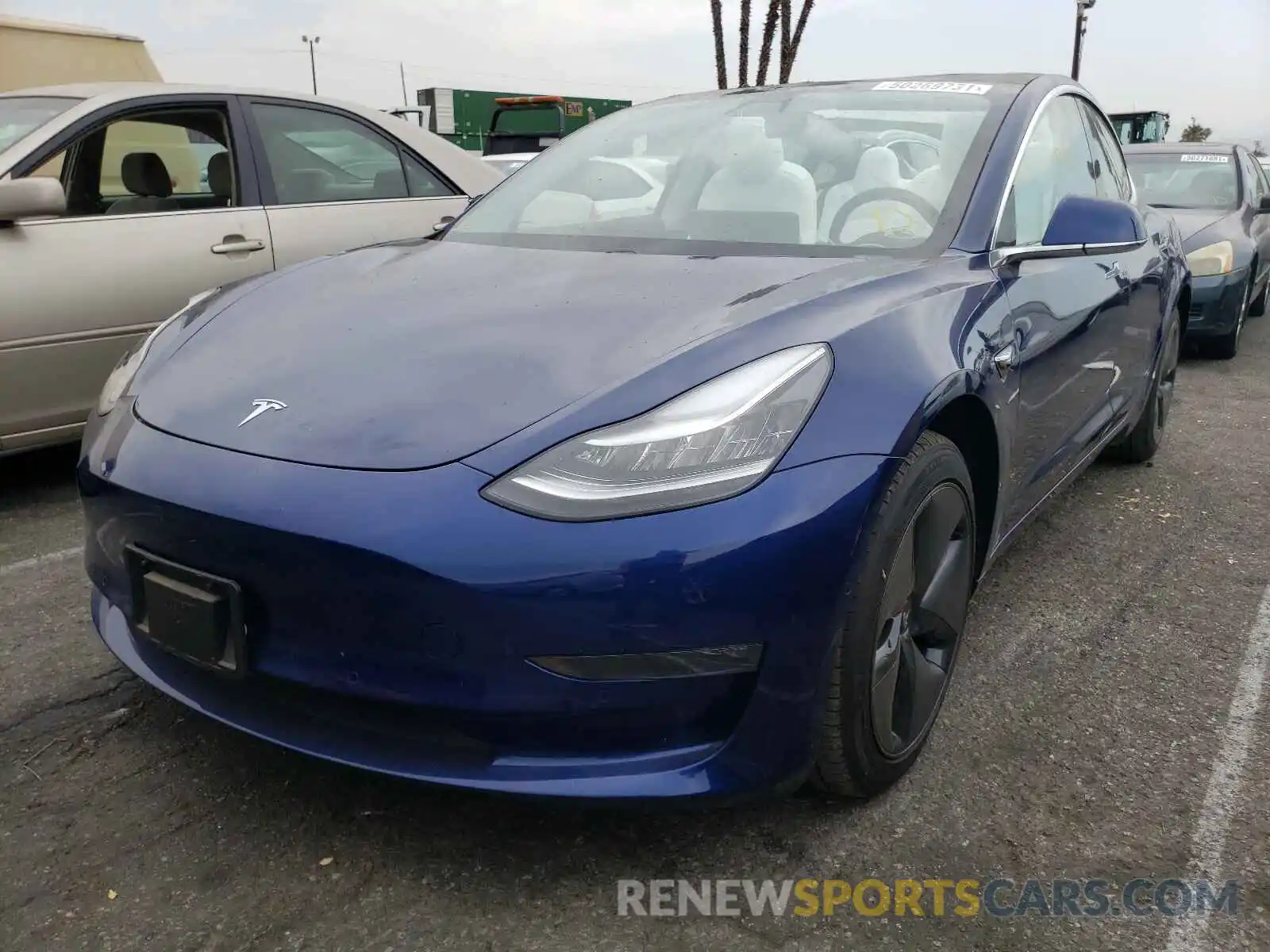 2 Photograph of a damaged car 5YJ3E1EB2KF454415 TESLA MODEL 3 2019