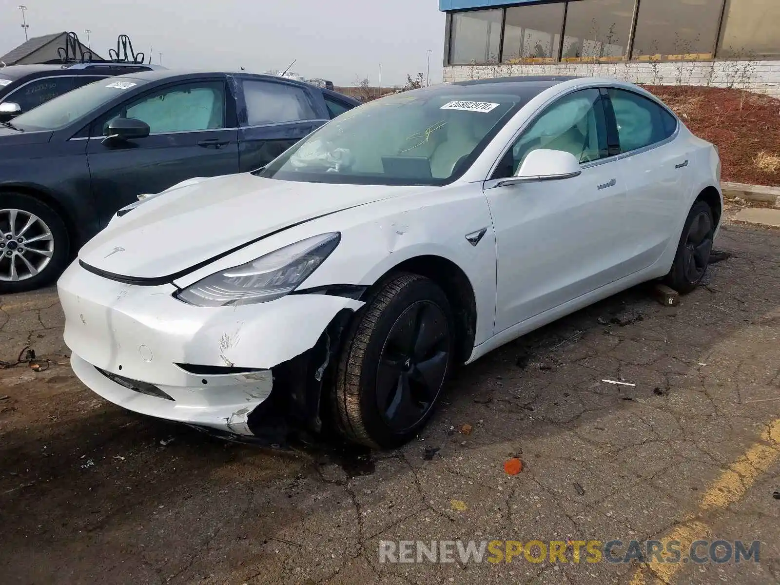 2 Photograph of a damaged car 5YJ3E1EB2KF494428 TESLA MODEL 3 2019