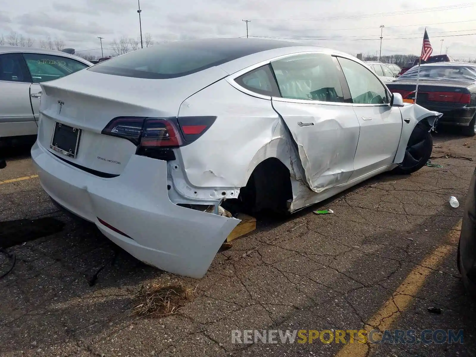 4 Photograph of a damaged car 5YJ3E1EB2KF494428 TESLA MODEL 3 2019