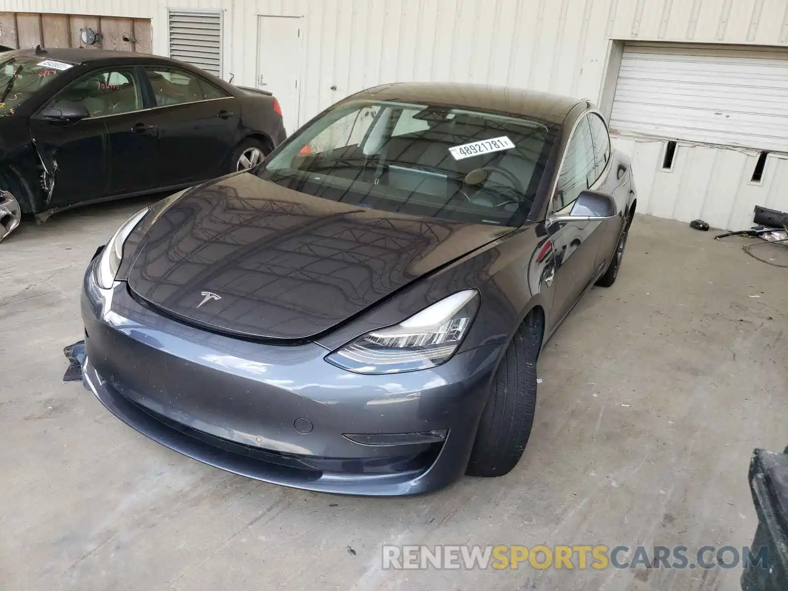 2 Photograph of a damaged car 5YJ3E1EB2KF520736 TESLA MODEL 3 2019