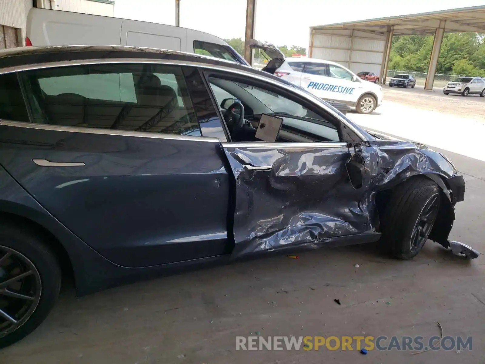 9 Photograph of a damaged car 5YJ3E1EB2KF520736 TESLA MODEL 3 2019