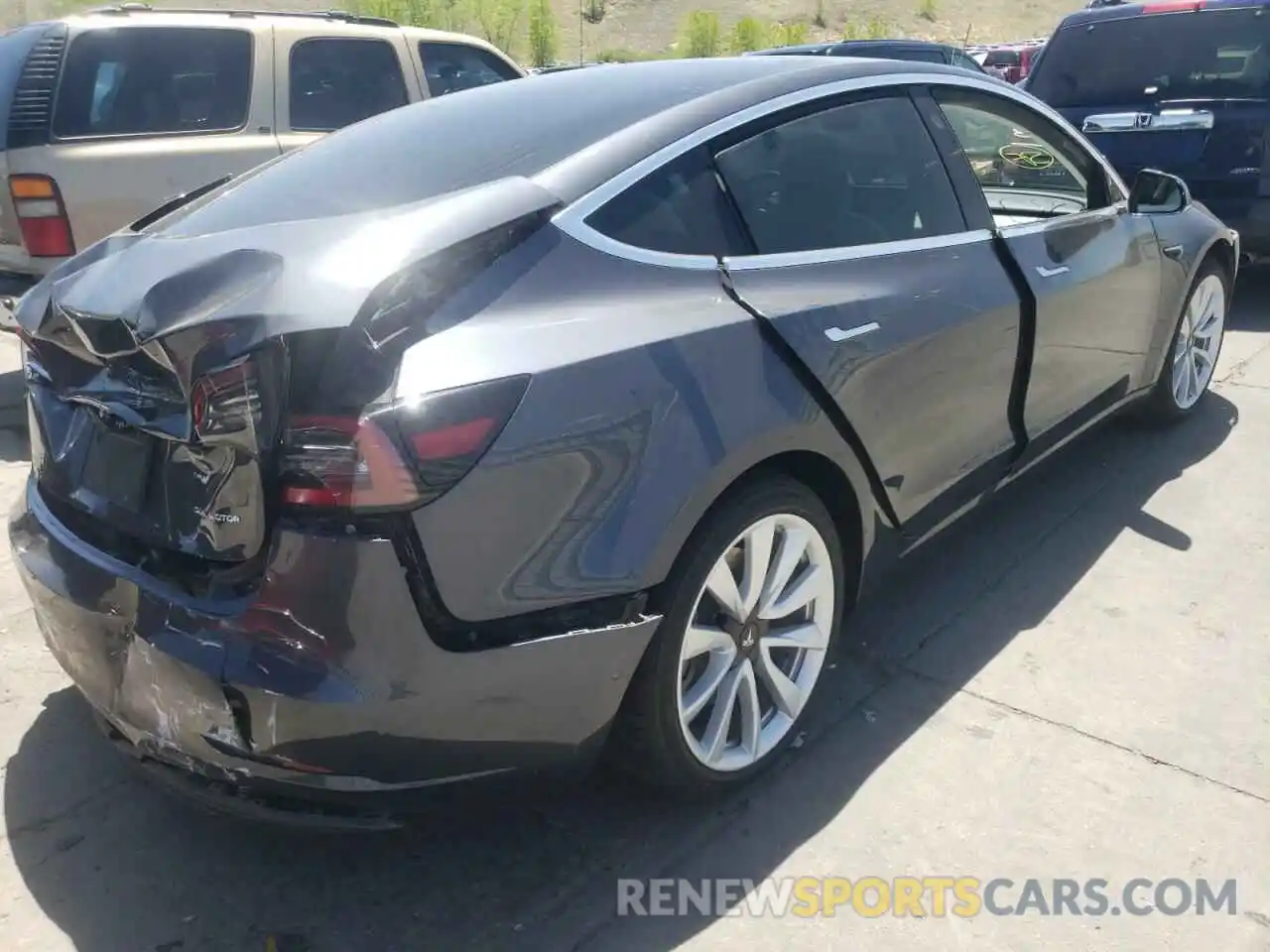 4 Photograph of a damaged car 5YJ3E1EB3KF195742 TESLA MODEL 3 2019