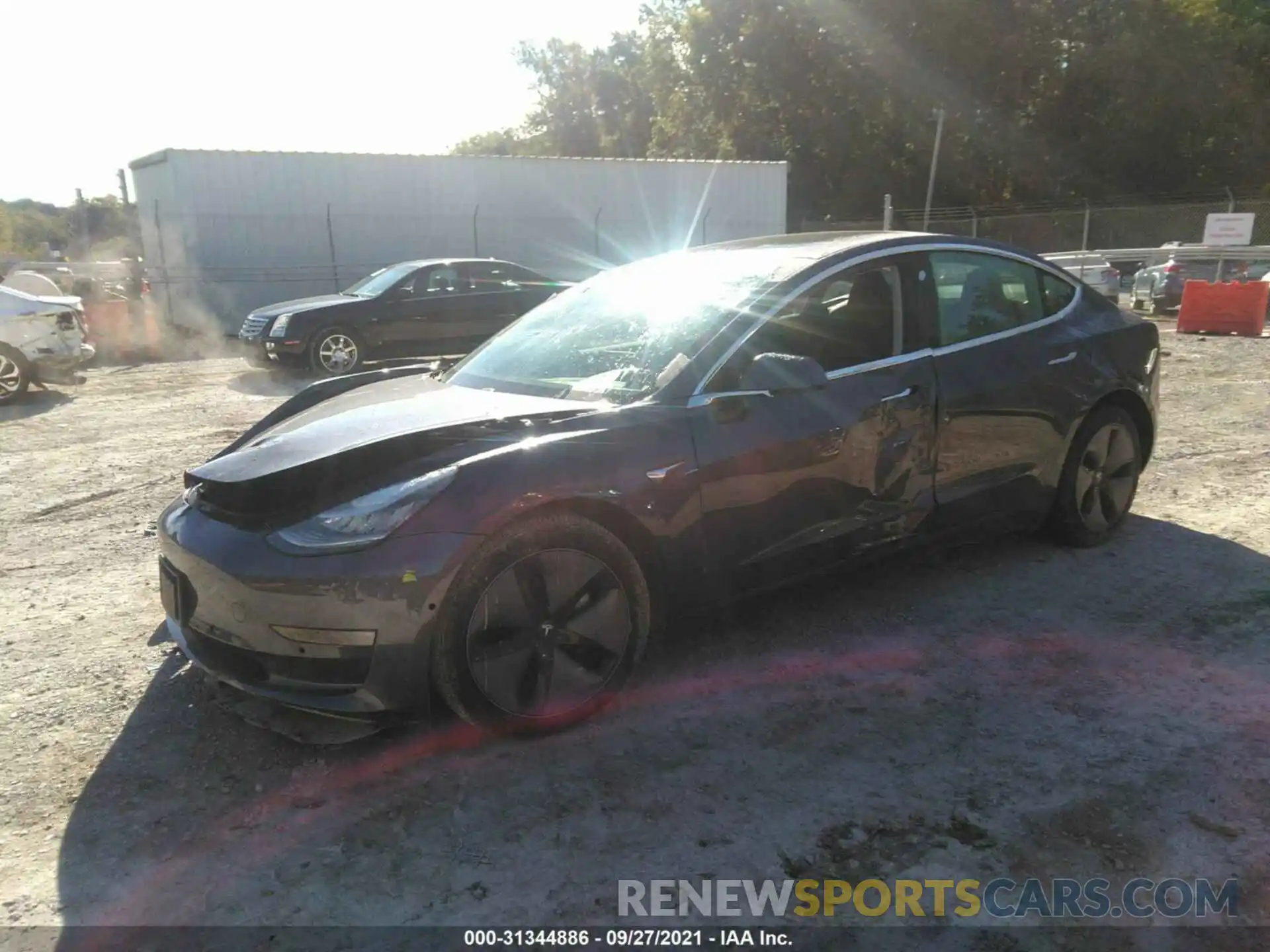 2 Photograph of a damaged car 5YJ3E1EB3KF209803 TESLA MODEL 3 2019