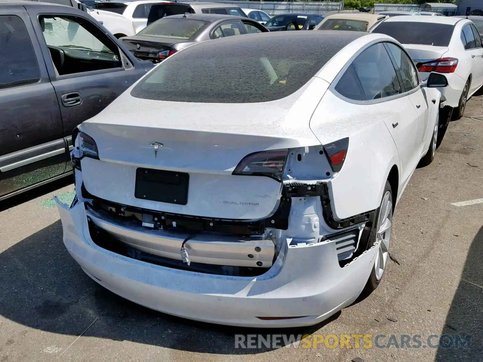 4 Photograph of a damaged car 5YJ3E1EB3KF365128 TESLA MODEL 3 2019