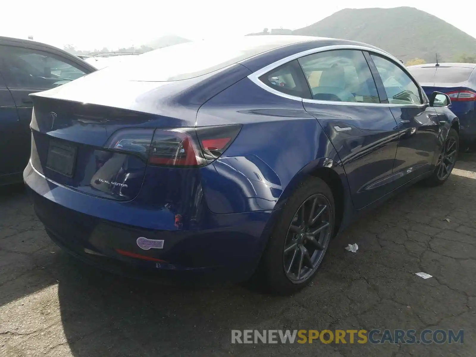 4 Photograph of a damaged car 5YJ3E1EB3KF407278 TESLA MODEL 3 2019