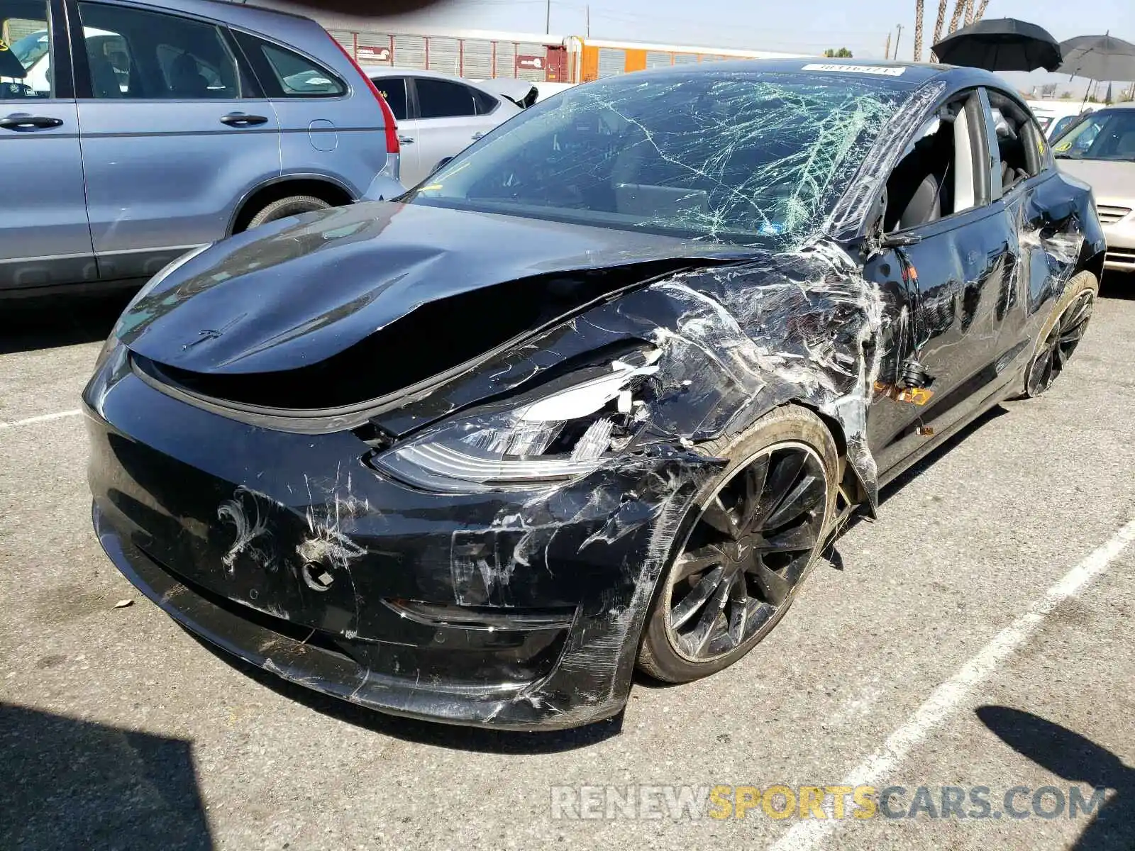 2 Photograph of a damaged car 5YJ3E1EB3KF413369 TESLA MODEL 3 2019