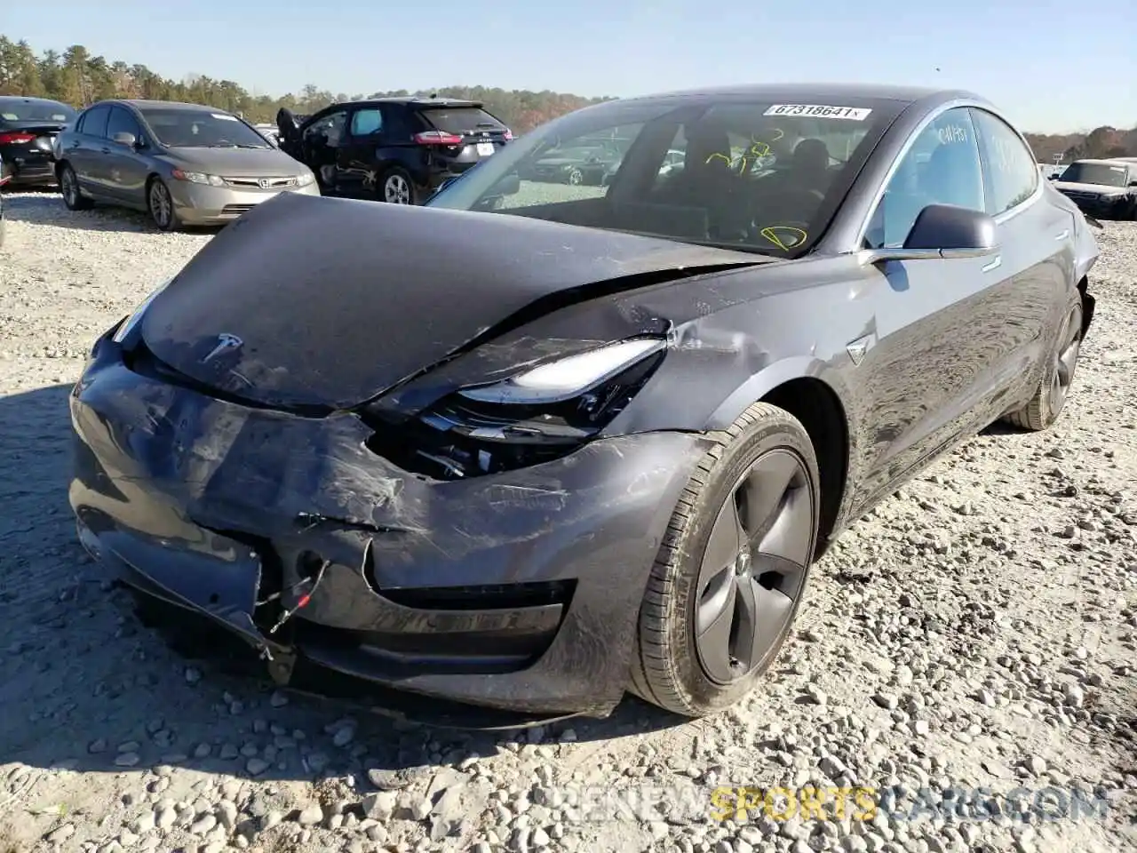 2 Photograph of a damaged car 5YJ3E1EB3KF493725 TESLA MODEL 3 2019