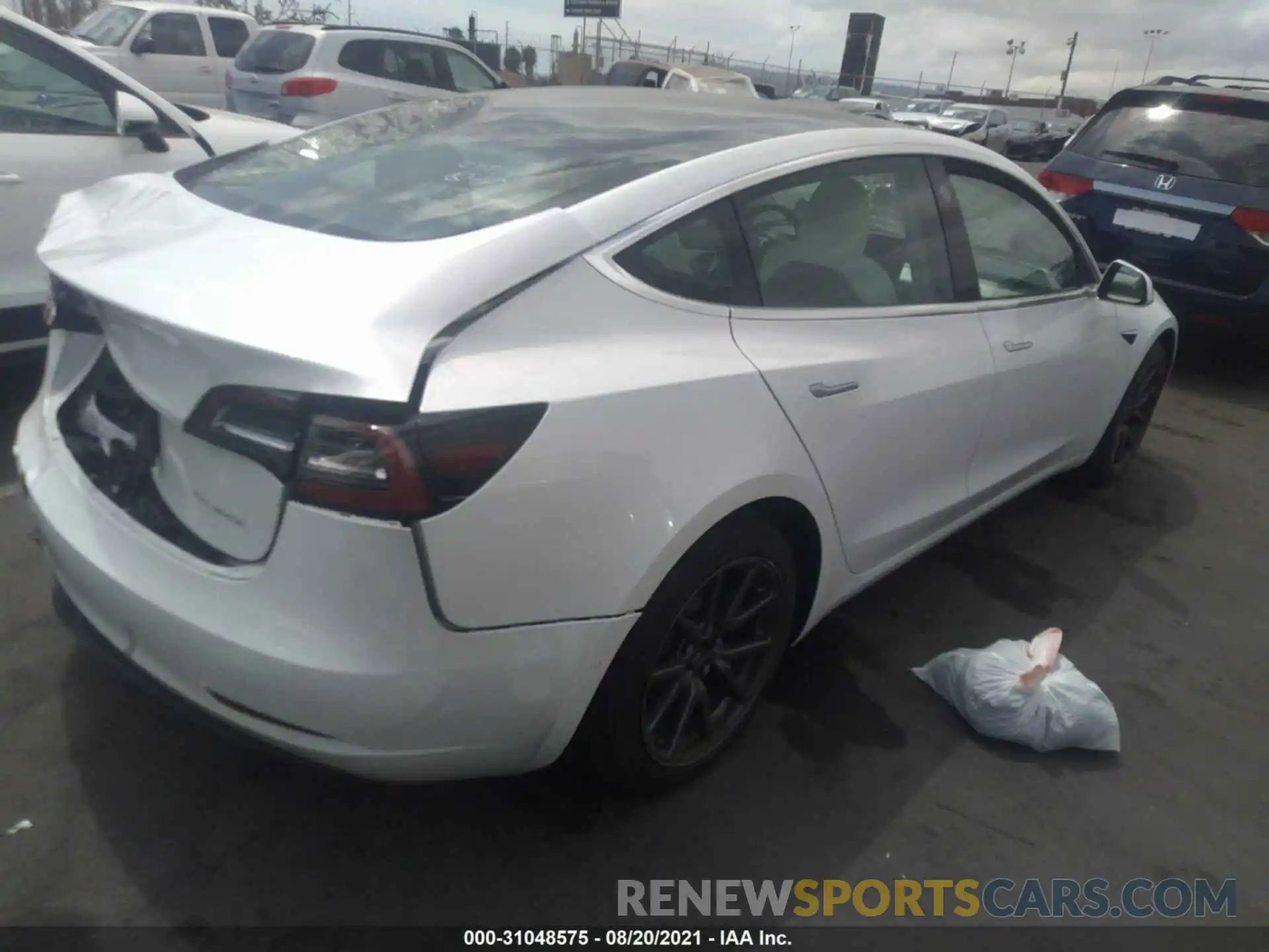 4 Photograph of a damaged car 5YJ3E1EB3KF513004 TESLA MODEL 3 2019