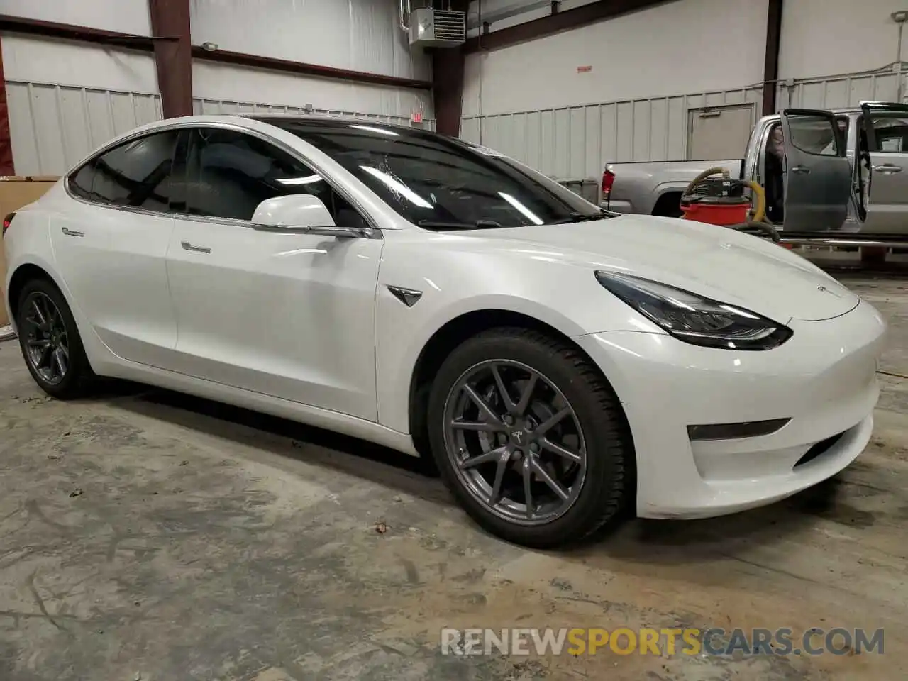 4 Photograph of a damaged car 5YJ3E1EB4KF191537 TESLA MODEL 3 2019