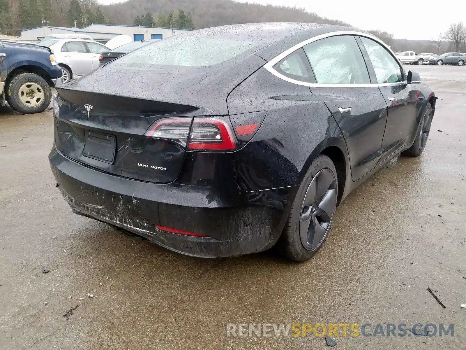 4 Photograph of a damaged car 5YJ3E1EB4KF194874 TESLA MODEL 3 2019