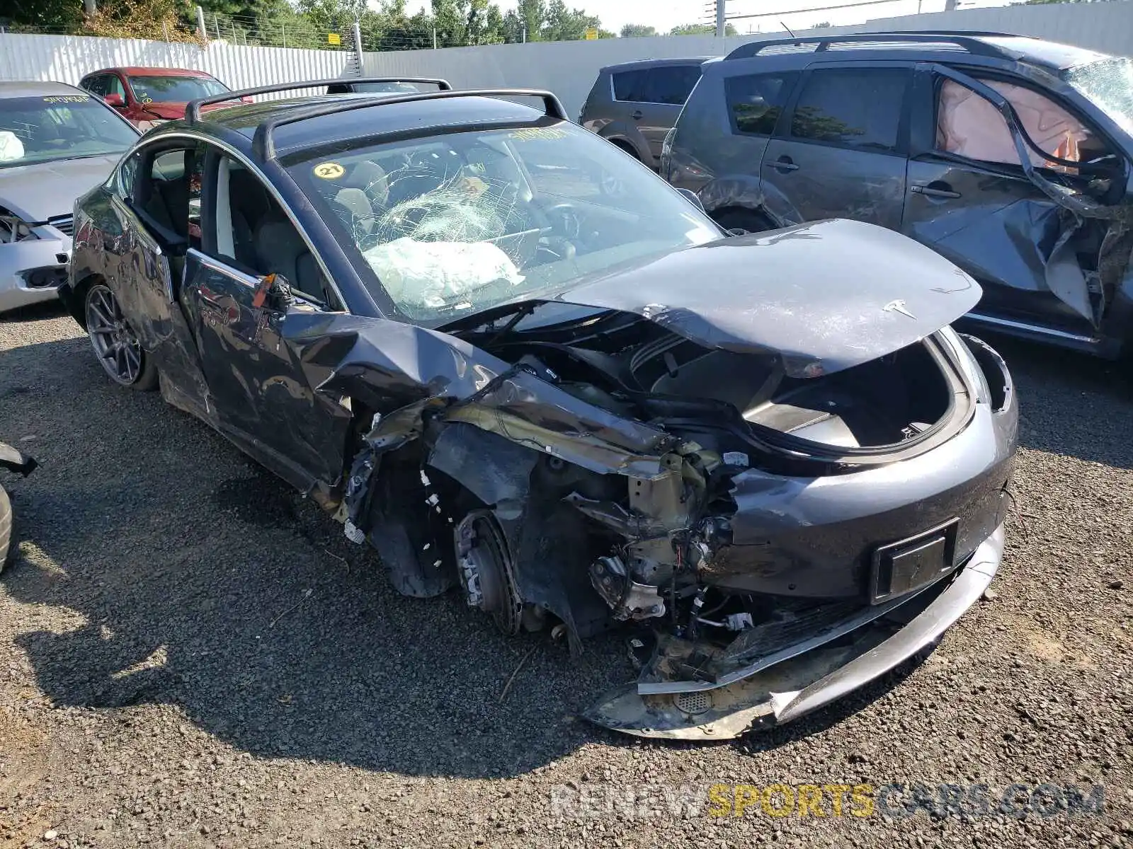 1 Photograph of a damaged car 5YJ3E1EB4KF205551 TESLA MODEL 3 2019