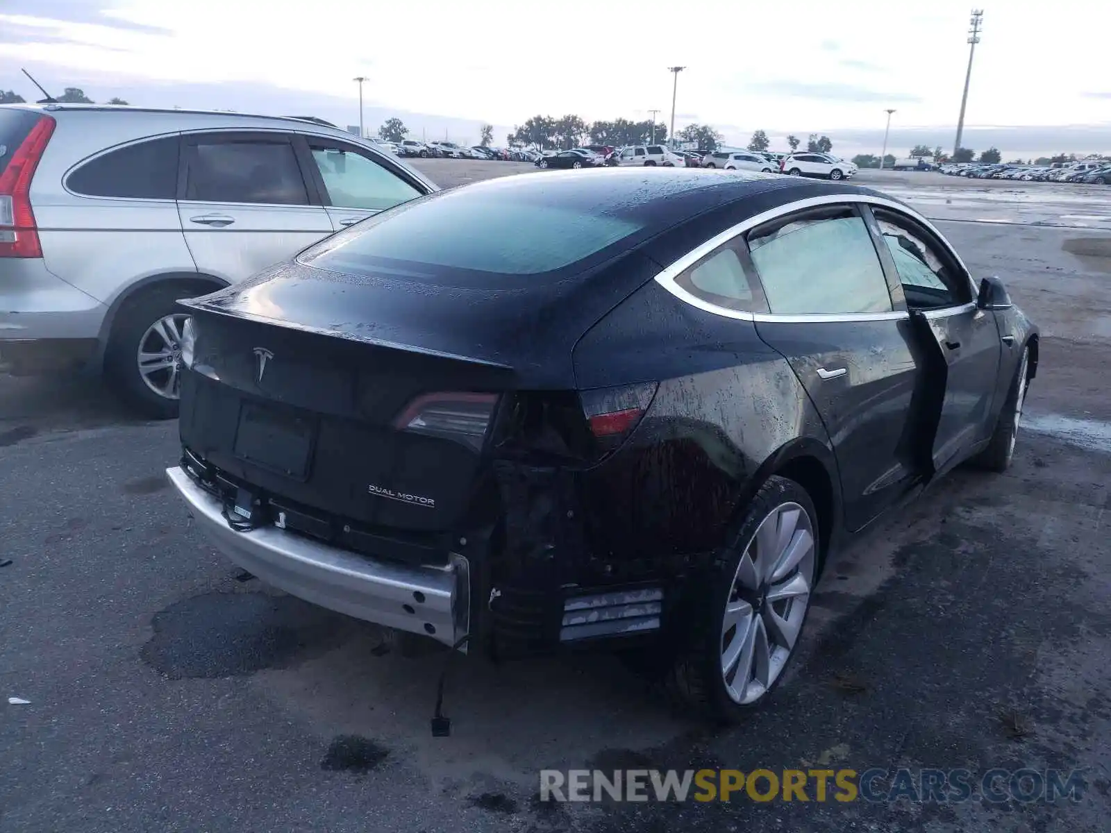 4 Photograph of a damaged car 5YJ3E1EB4KF237271 TESLA MODEL 3 2019