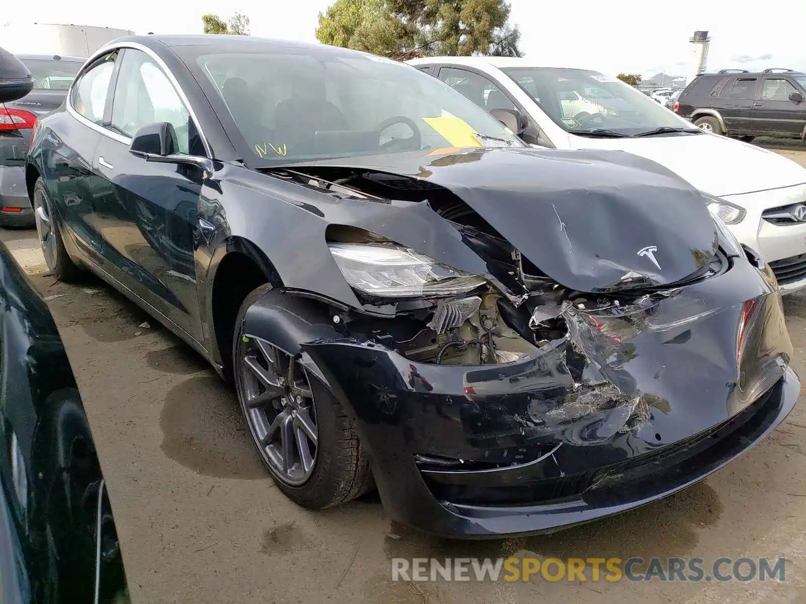 1 Photograph of a damaged car 5YJ3E1EB4KF385758 TESLA MODEL 3 2019