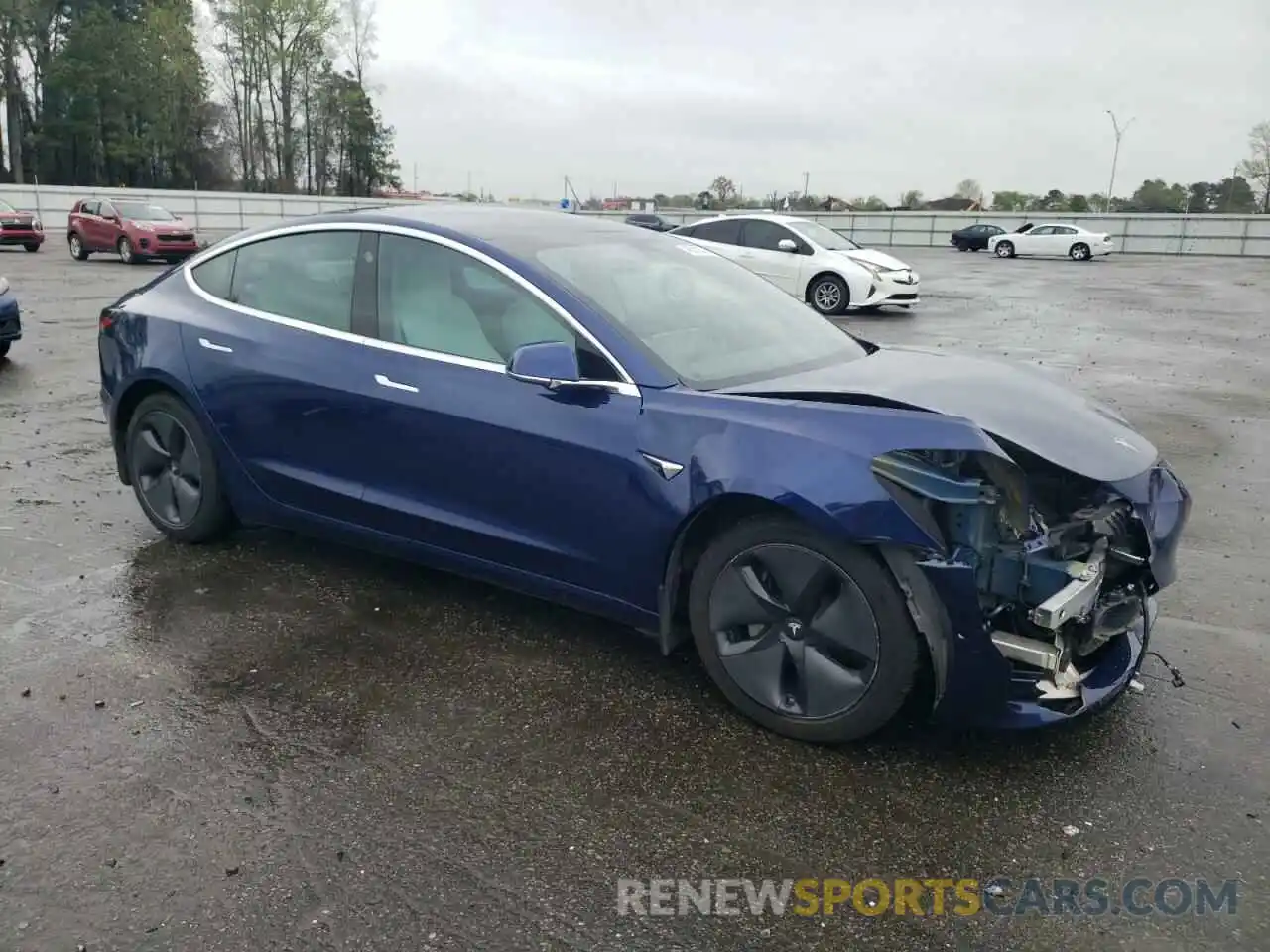 4 Photograph of a damaged car 5YJ3E1EB4KF391057 TESLA MODEL 3 2019