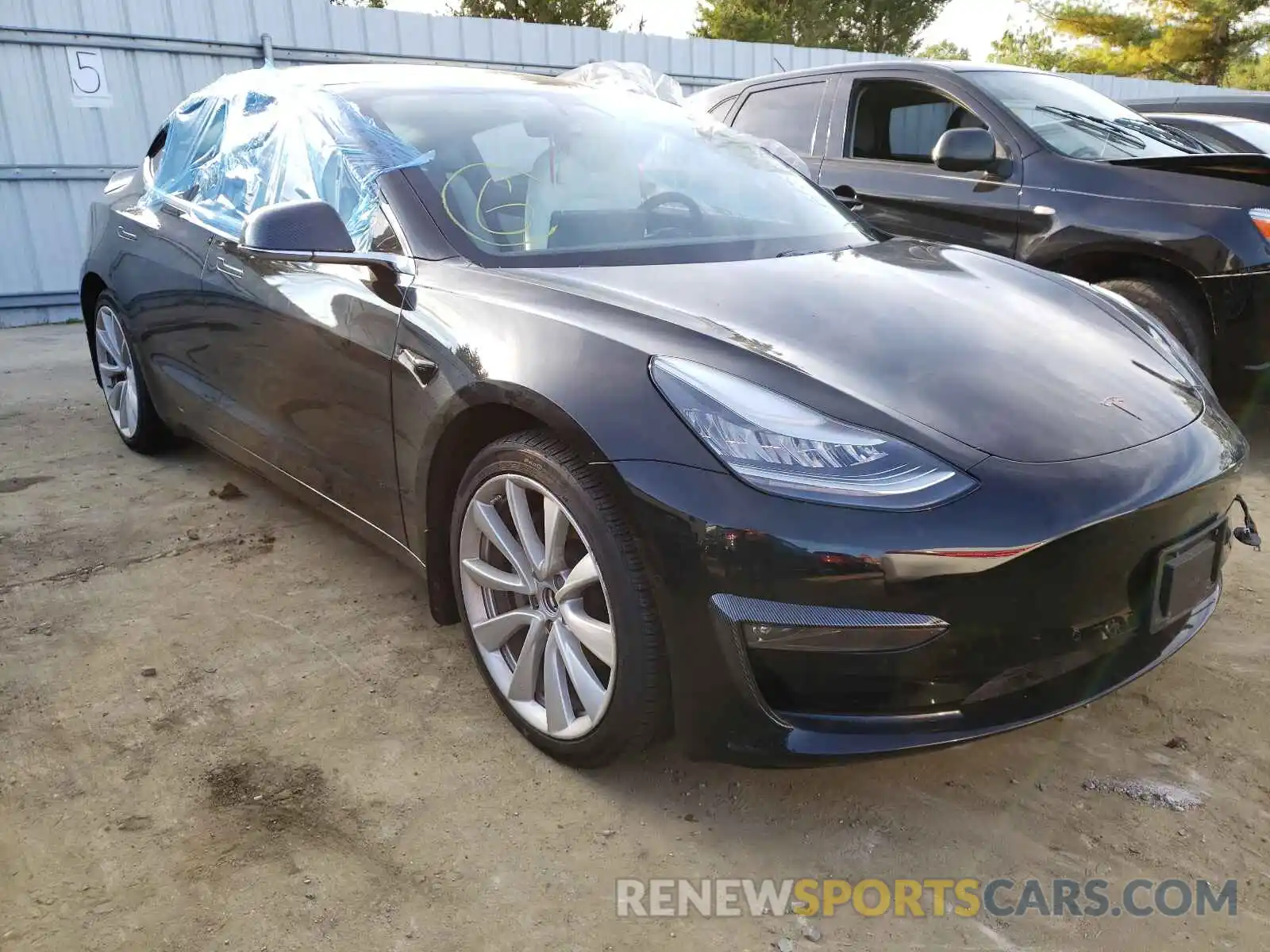 1 Photograph of a damaged car 5YJ3E1EB4KF391396 TESLA MODEL 3 2019