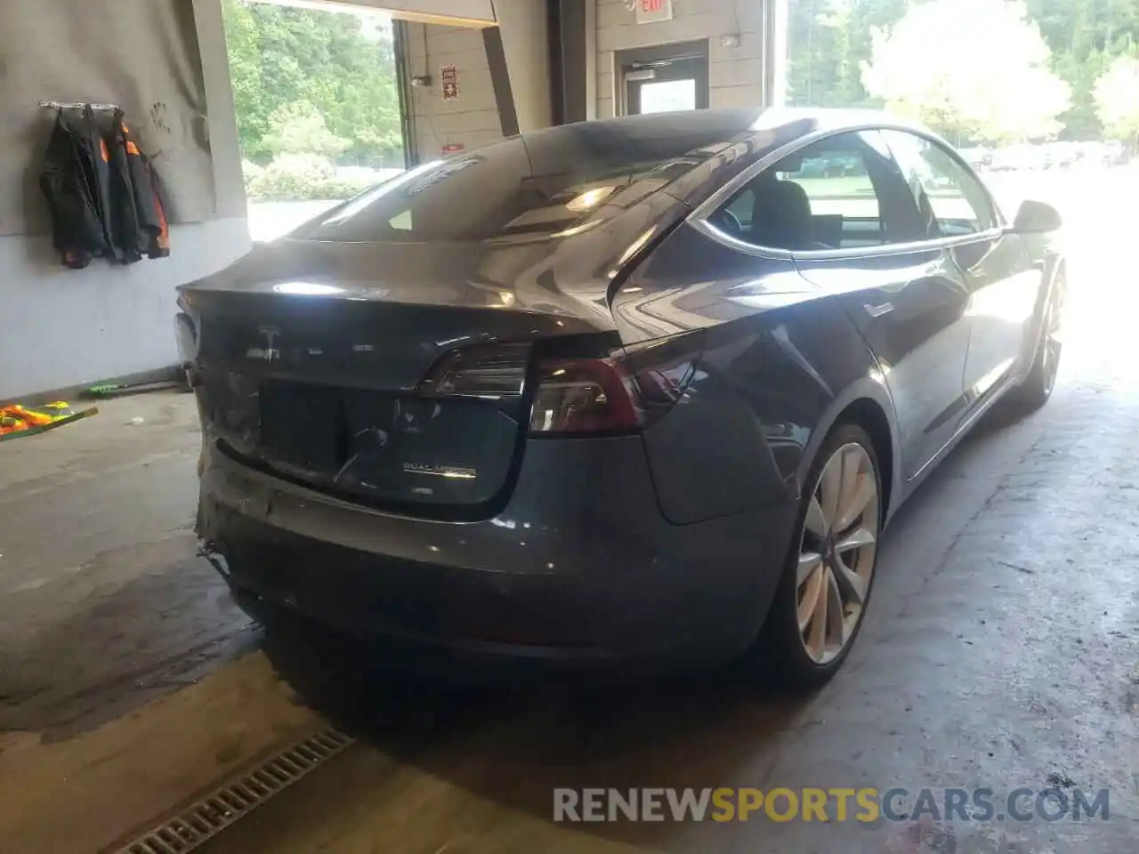 4 Photograph of a damaged car 5YJ3E1EB4KF423151 TESLA MODEL 3 2019