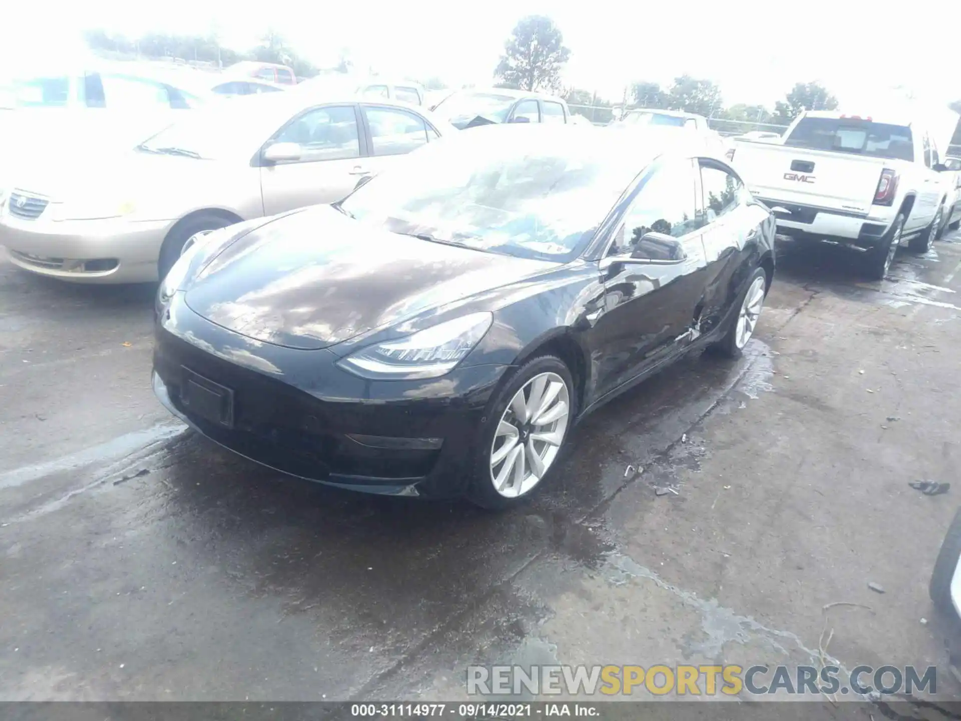 2 Photograph of a damaged car 5YJ3E1EB4KF437468 TESLA MODEL 3 2019