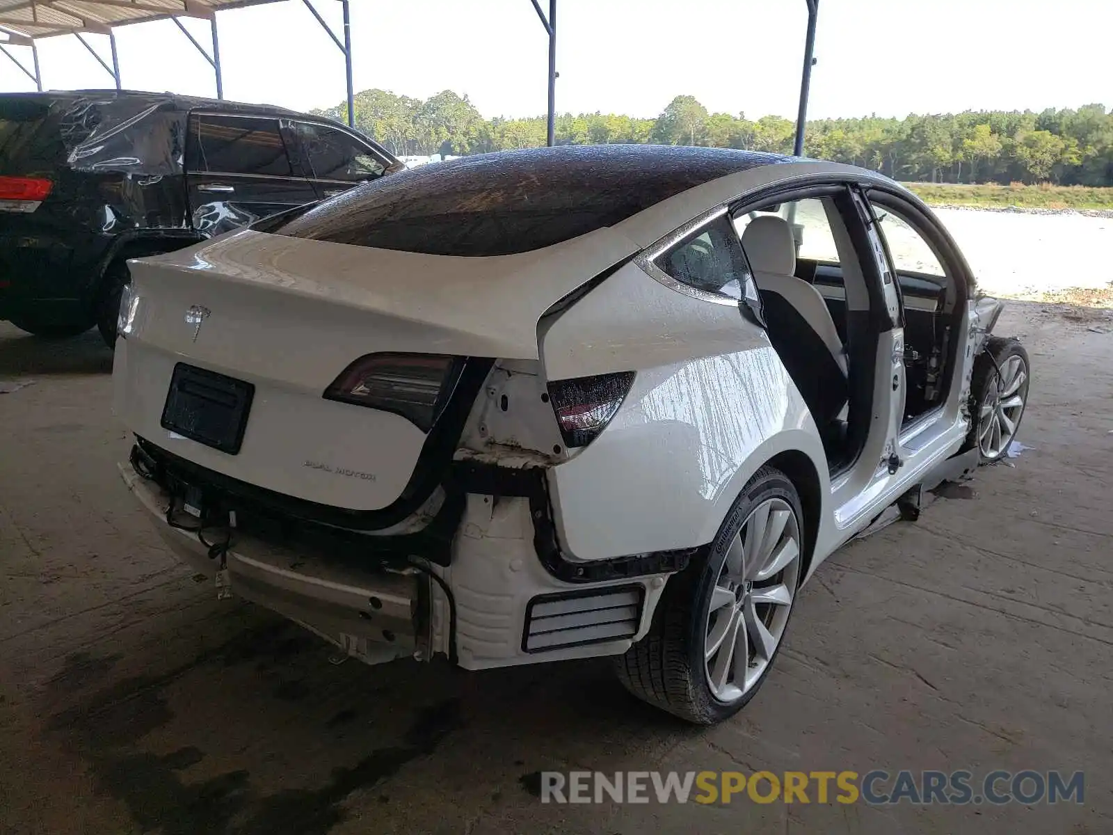 4 Photograph of a damaged car 5YJ3E1EB4KF437857 TESLA MODEL 3 2019