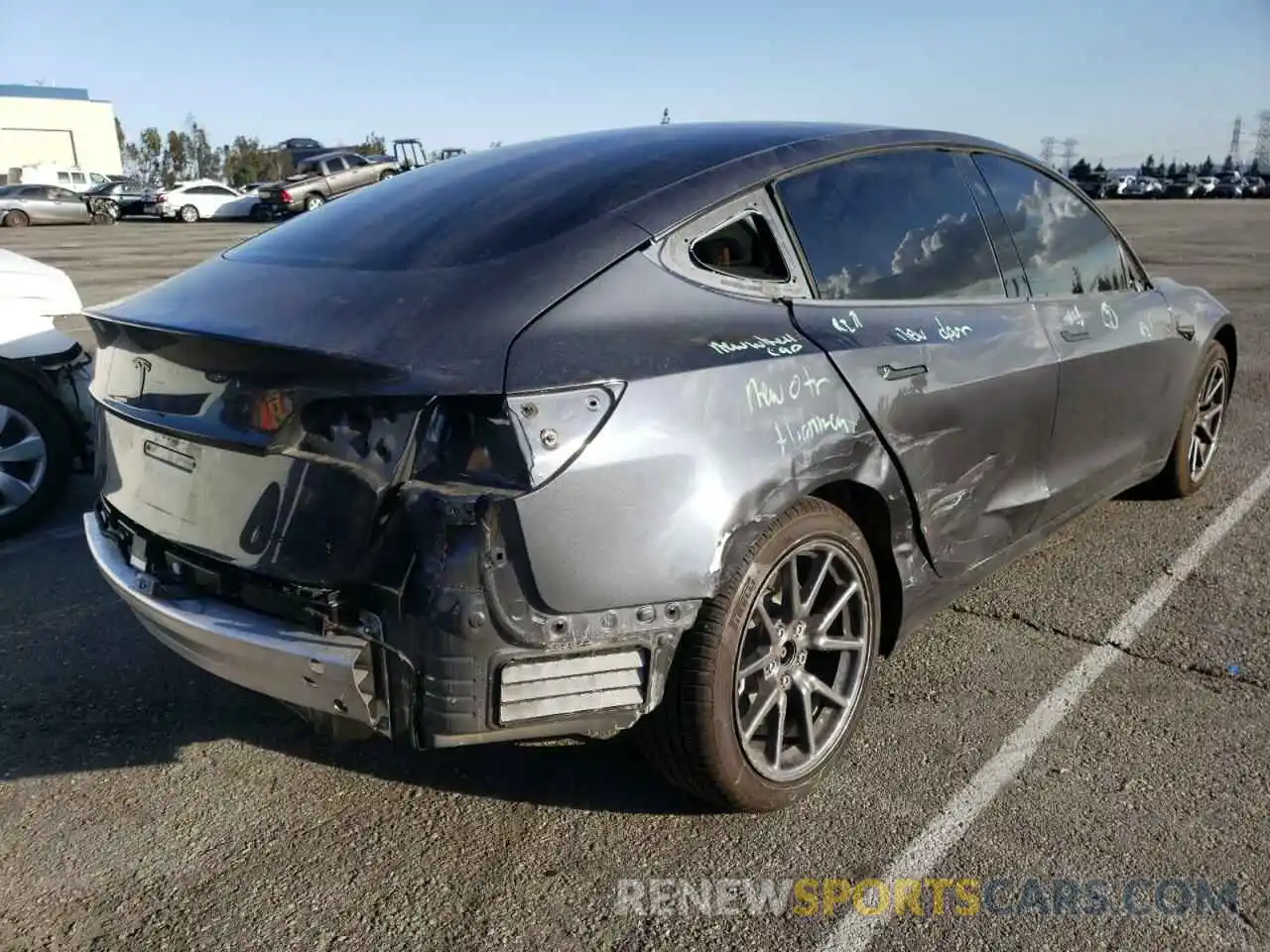 4 Photograph of a damaged car 5YJ3E1EB4KF440452 TESLA MODEL 3 2019