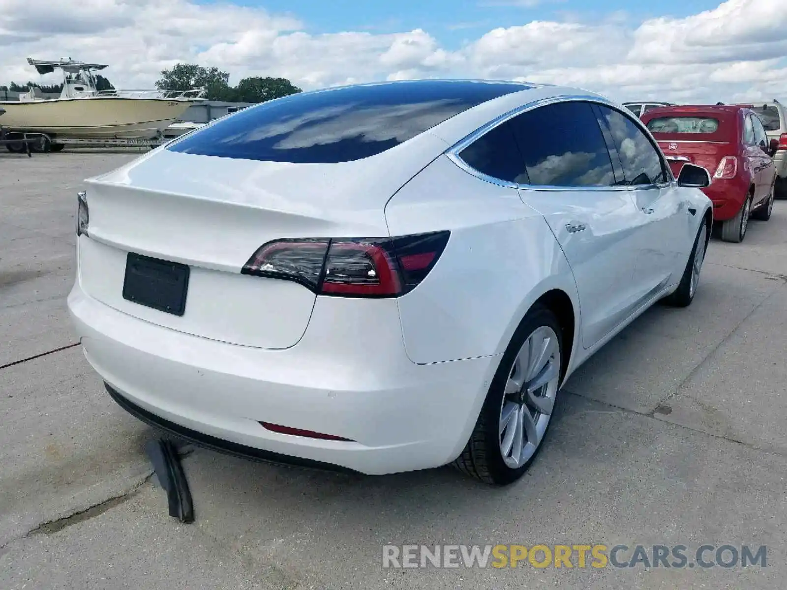 4 Фотография поврежденного автомобиля 5YJ3E1EB4KF450981 TESLA MODEL 3 2019