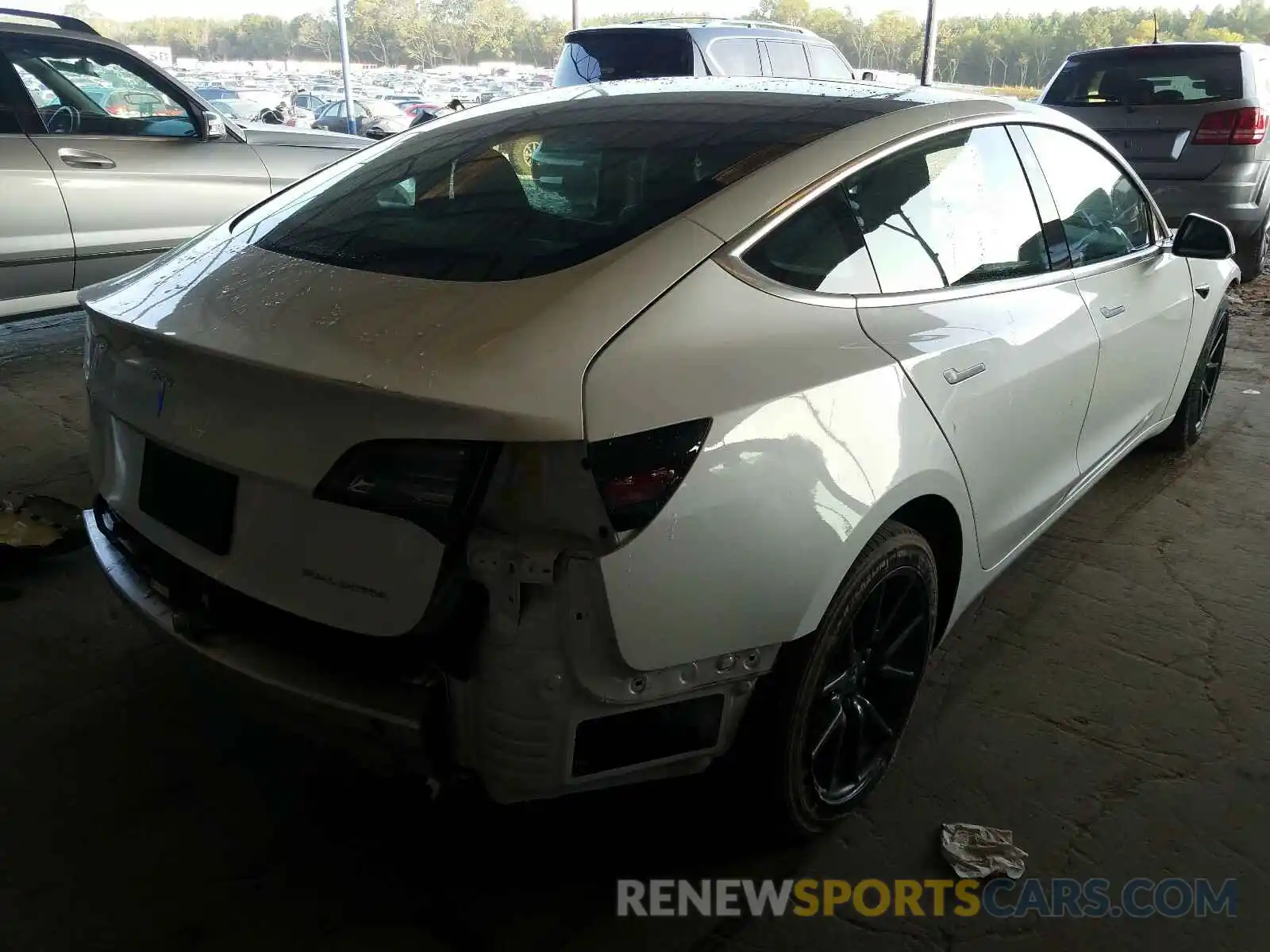 4 Photograph of a damaged car 5YJ3E1EB4KF469224 TESLA MODEL 3 2019