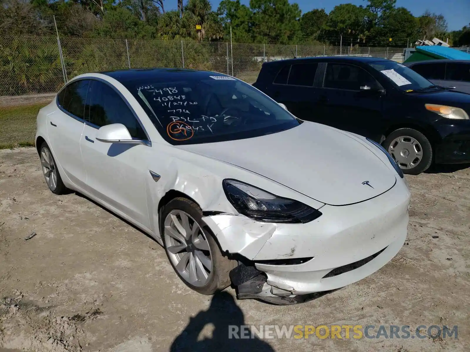 1 Photograph of a damaged car 5YJ3E1EB4KF477498 TESLA MODEL 3 2019