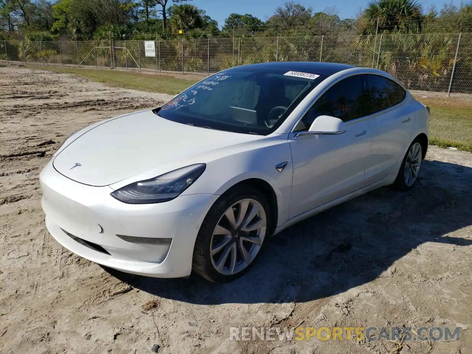 2 Photograph of a damaged car 5YJ3E1EB4KF477498 TESLA MODEL 3 2019