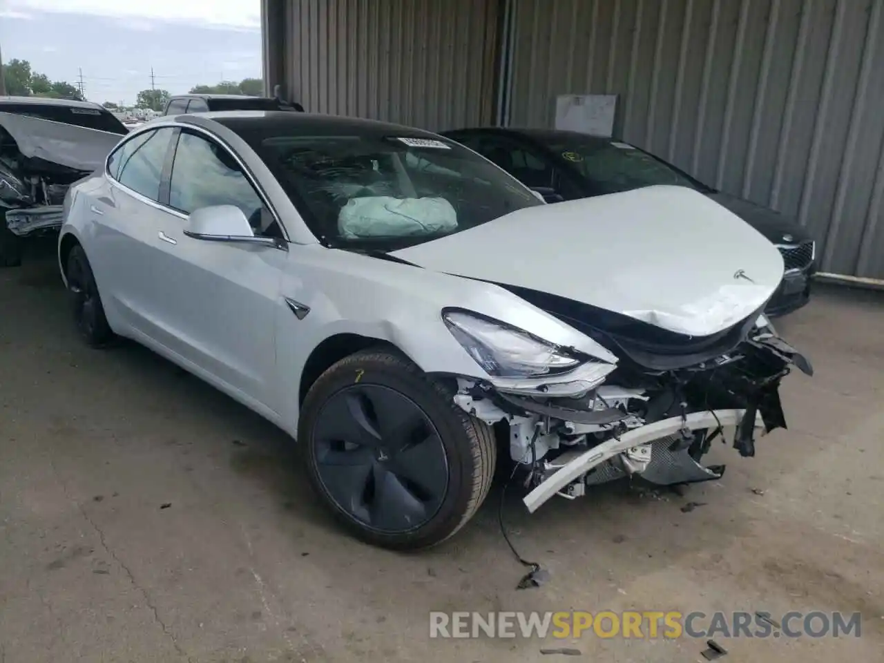 1 Photograph of a damaged car 5YJ3E1EB4KF493605 TESLA MODEL 3 2019