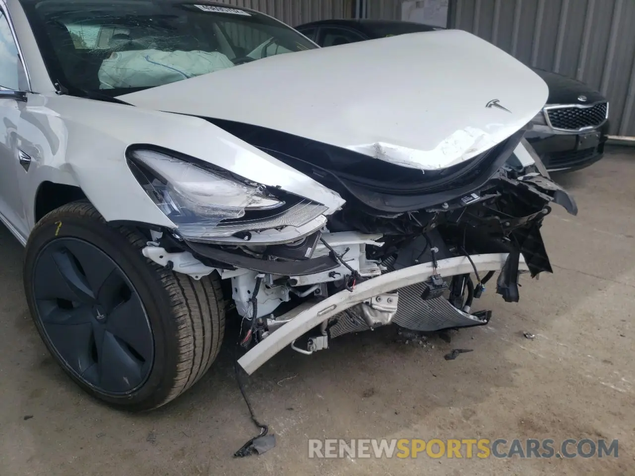 9 Photograph of a damaged car 5YJ3E1EB4KF493605 TESLA MODEL 3 2019