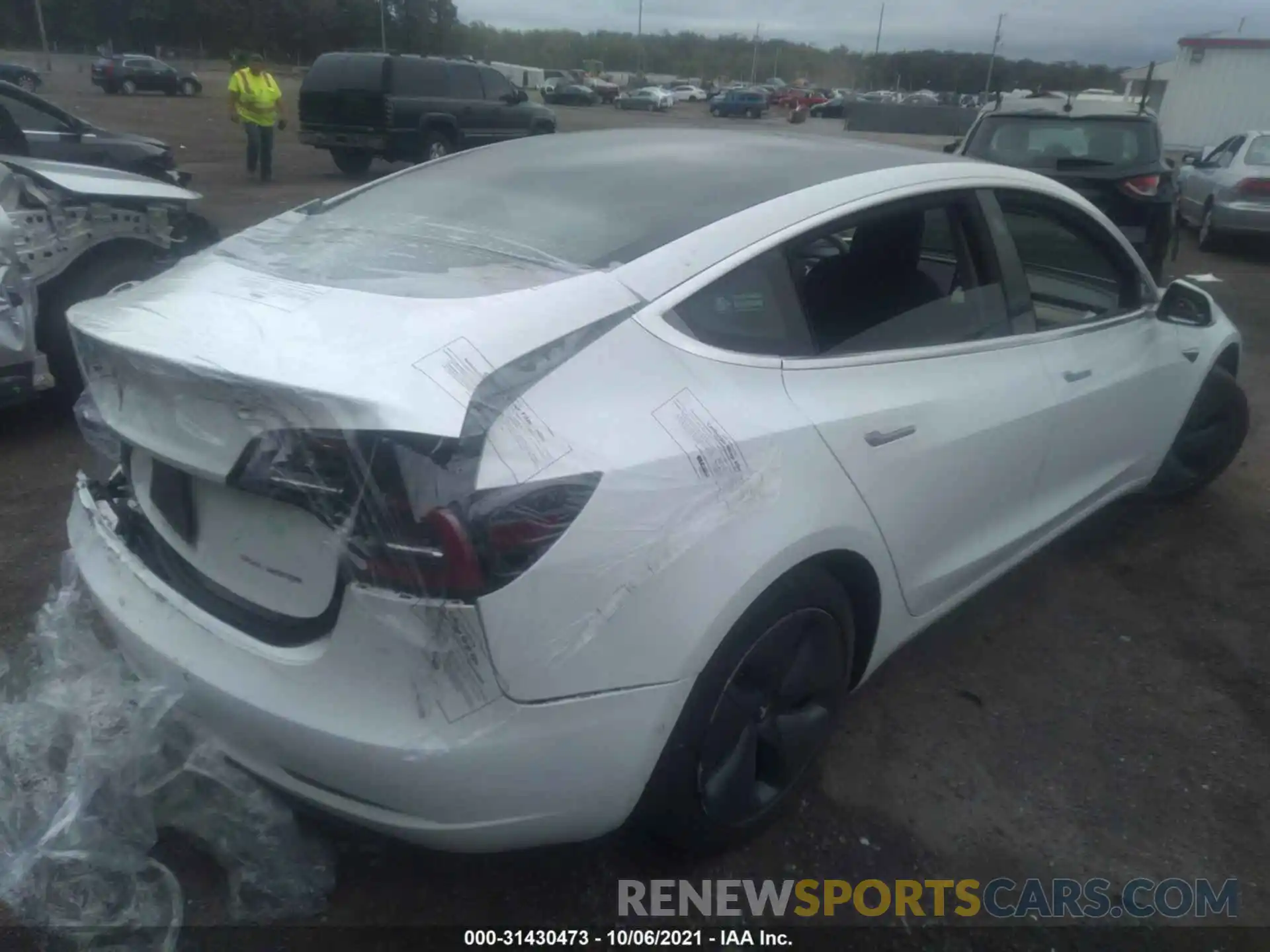 4 Photograph of a damaged car 5YJ3E1EB4KF510631 TESLA MODEL 3 2019