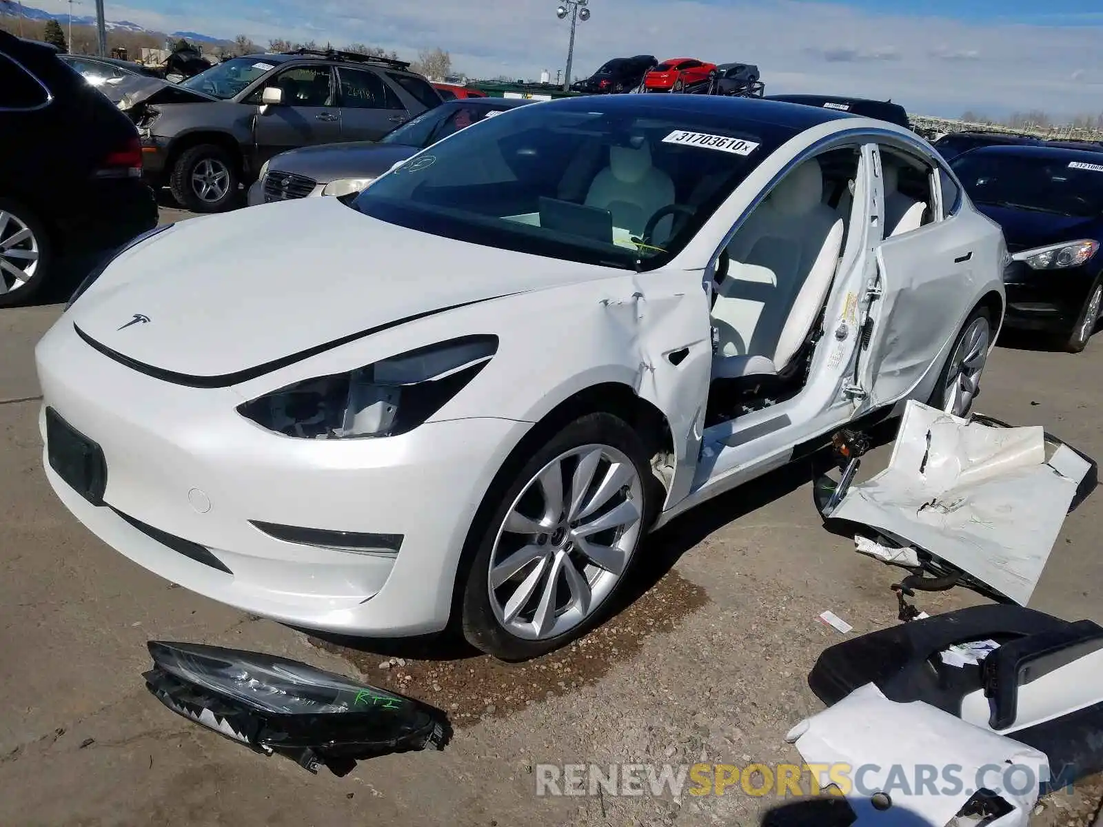 2 Photograph of a damaged car 5YJ3E1EB4KF513352 TESLA MODEL 3 2019