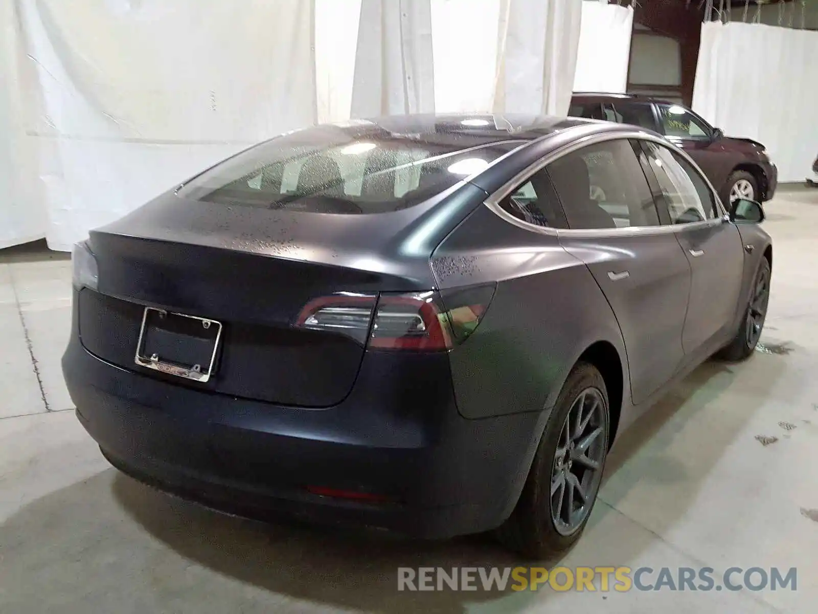 4 Photograph of a damaged car 5YJ3E1EB5KF208572 TESLA MODEL 3 2019