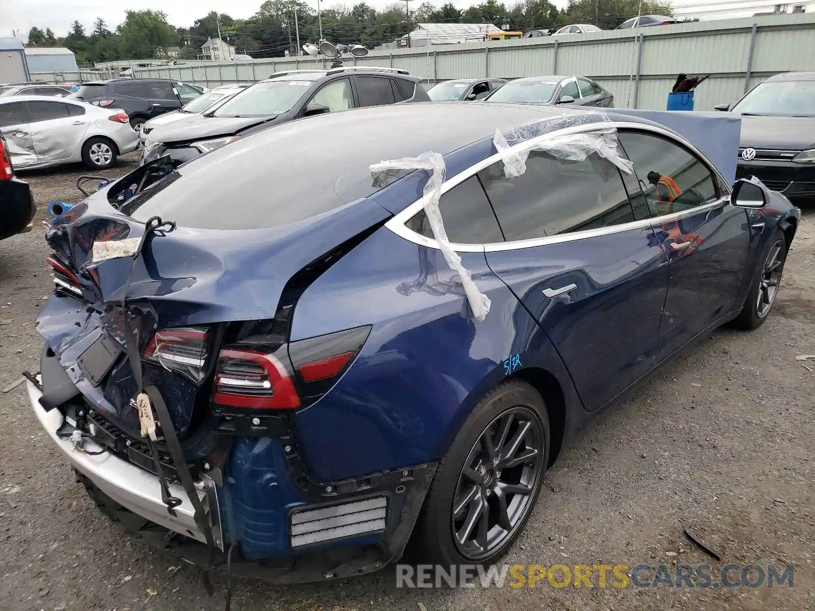 4 Photograph of a damaged car 5YJ3E1EB5KF359458 TESLA MODEL 3 2019