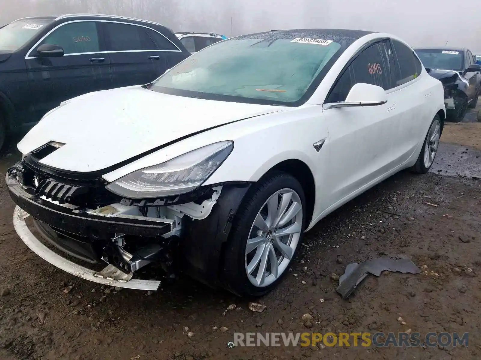 2 Photograph of a damaged car 5YJ3E1EB5KF365759 TESLA MODEL 3 2019