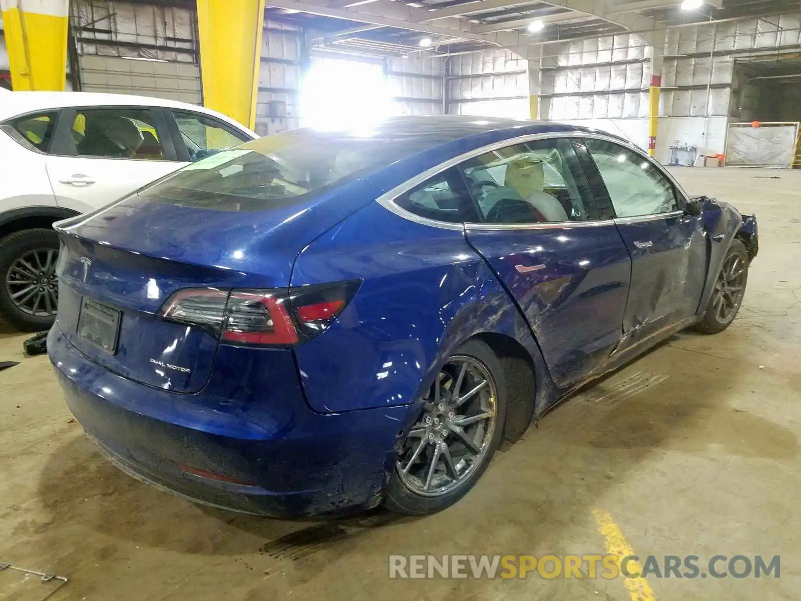 4 Photograph of a damaged car 5YJ3E1EB5KF391102 TESLA MODEL 3 2019