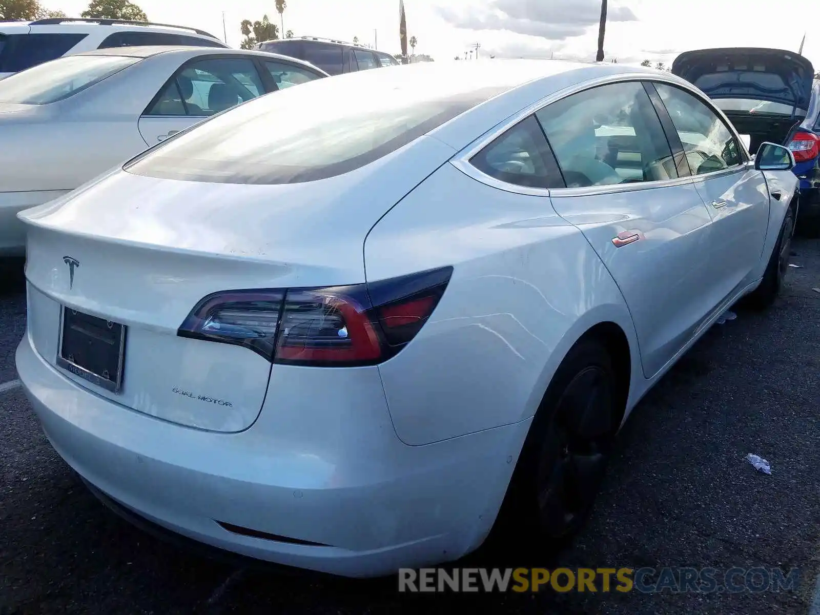 4 Photograph of a damaged car 5YJ3E1EB5KF421571 TESLA MODEL 3 2019