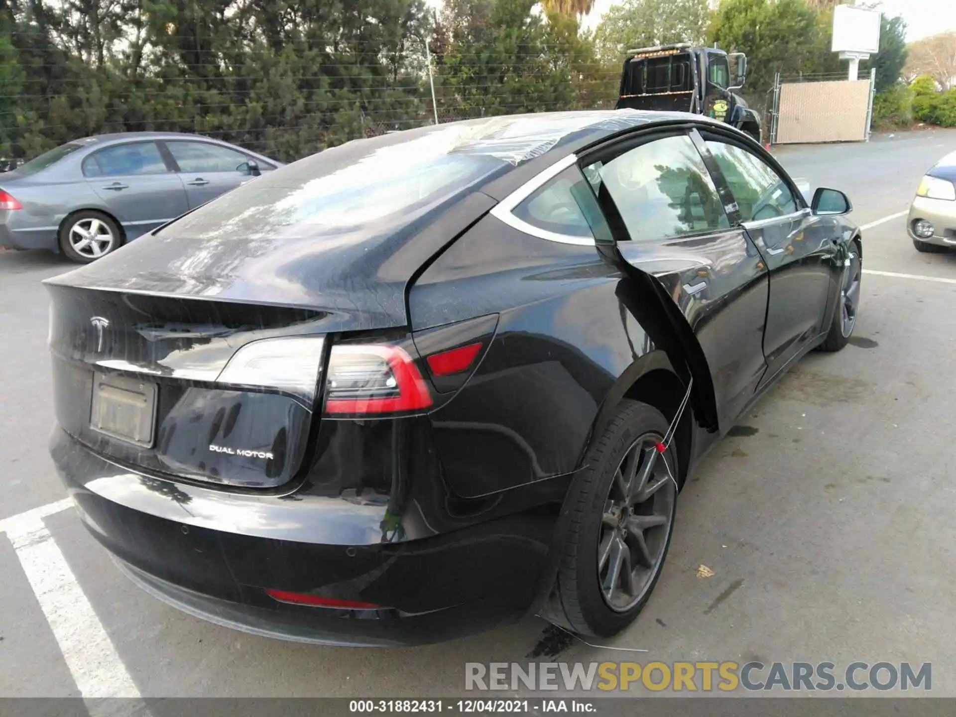 4 Photograph of a damaged car 5YJ3E1EB5KF451704 TESLA MODEL 3 2019