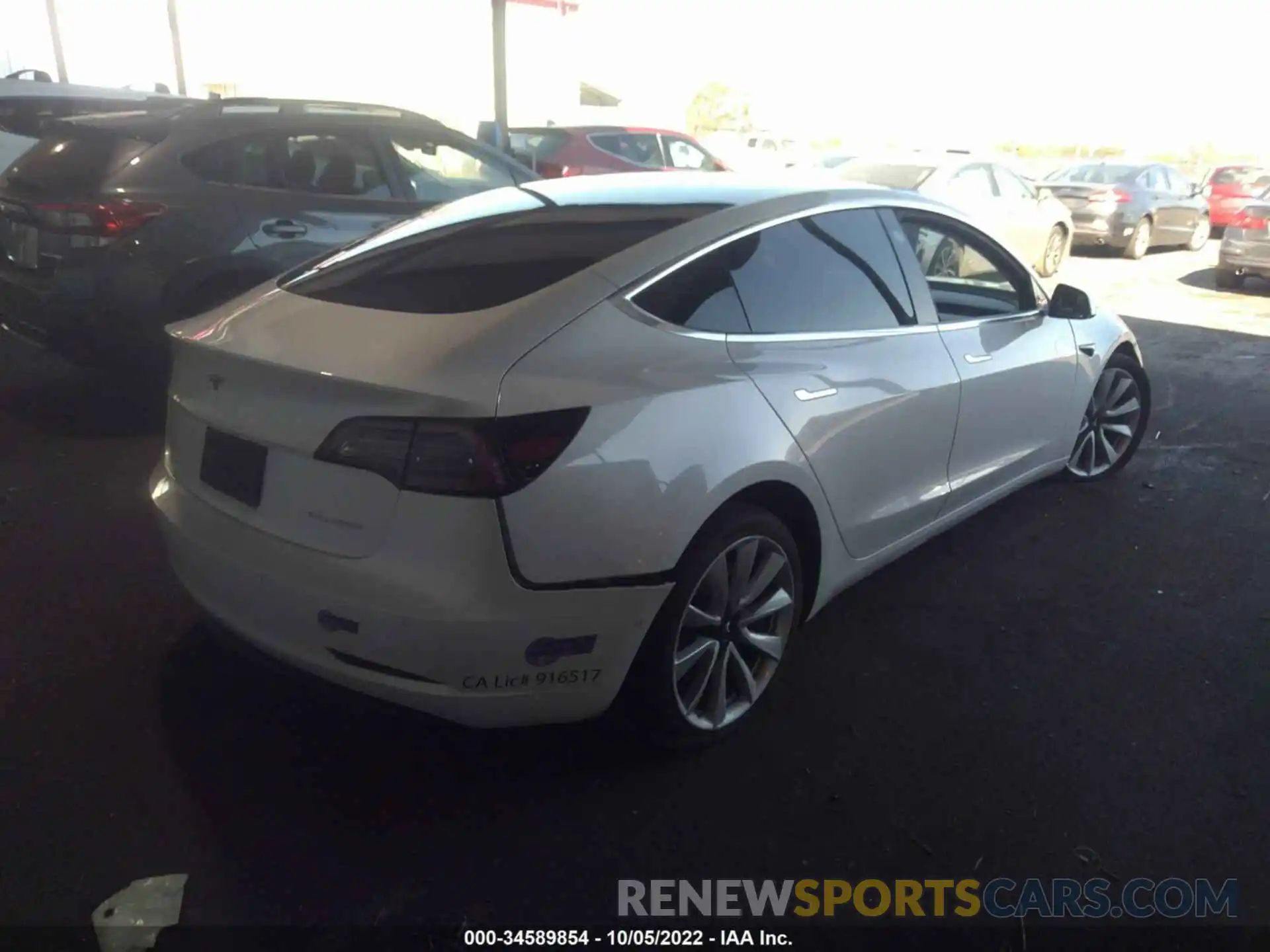 4 Photograph of a damaged car 5YJ3E1EB6KF213876 TESLA MODEL 3 2019